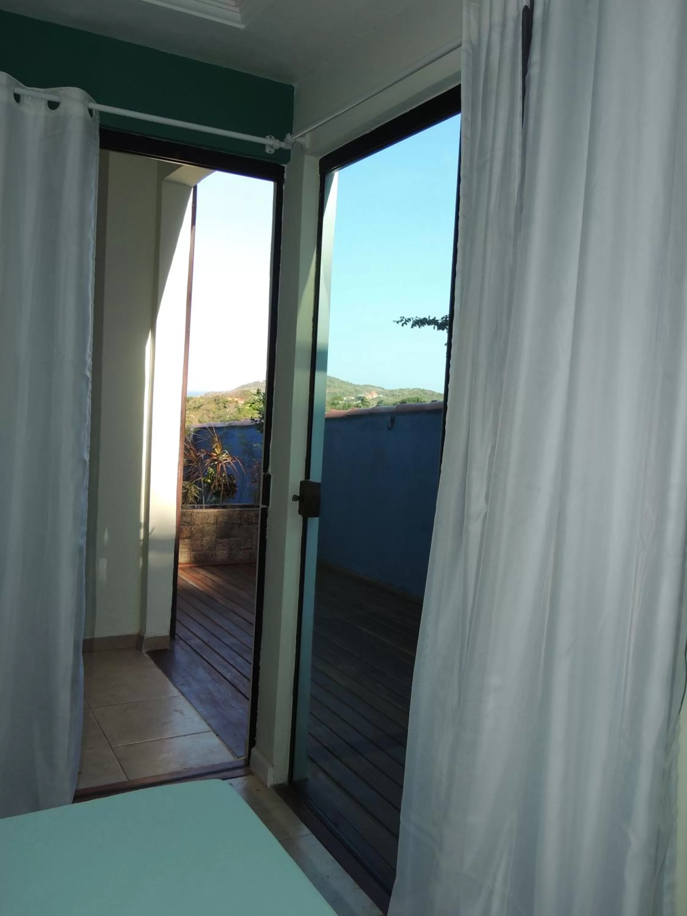 View (from property/room), Bed in Pousada Akaroa