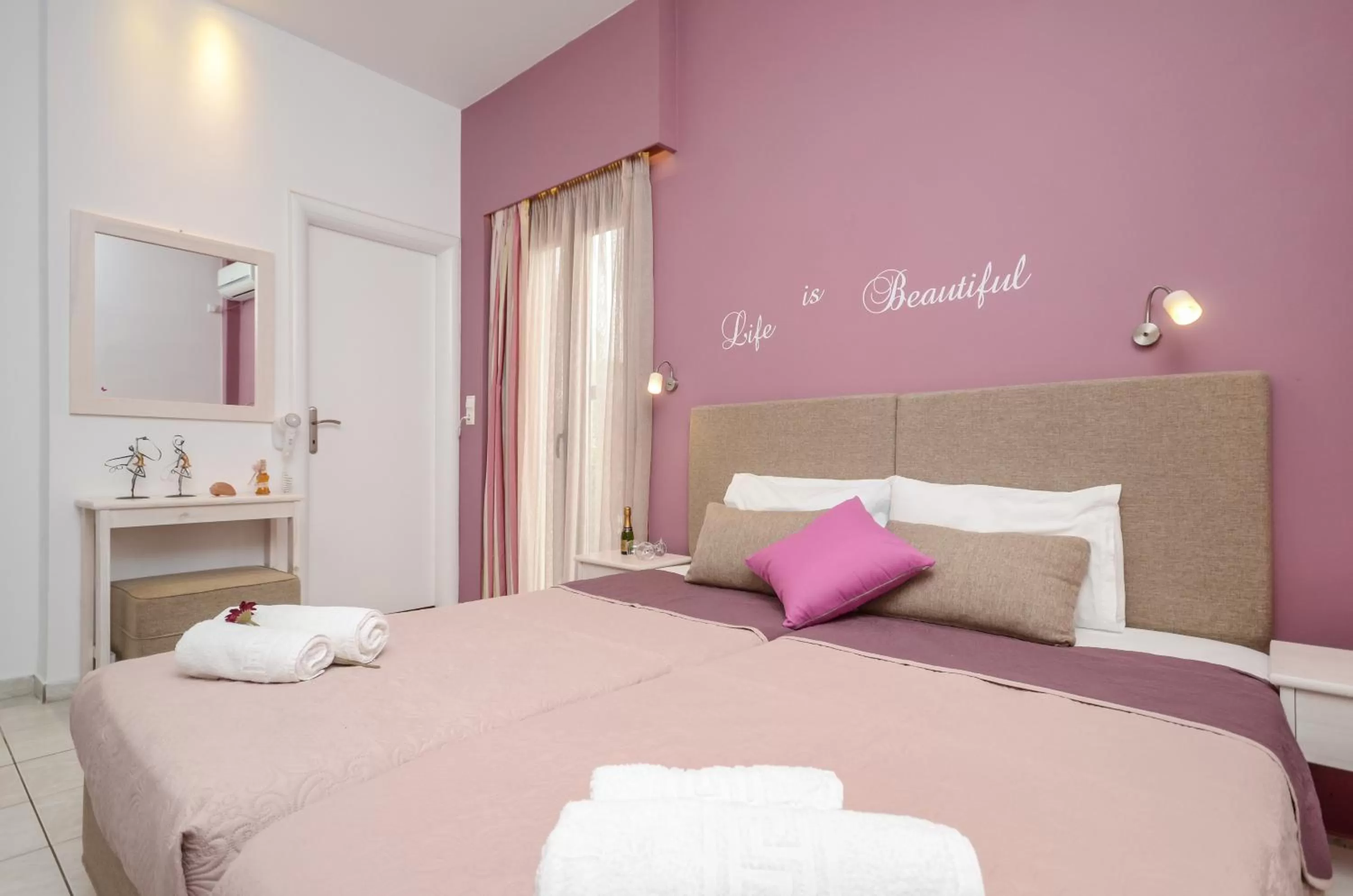 Bed in Panormos Hotel and Studios