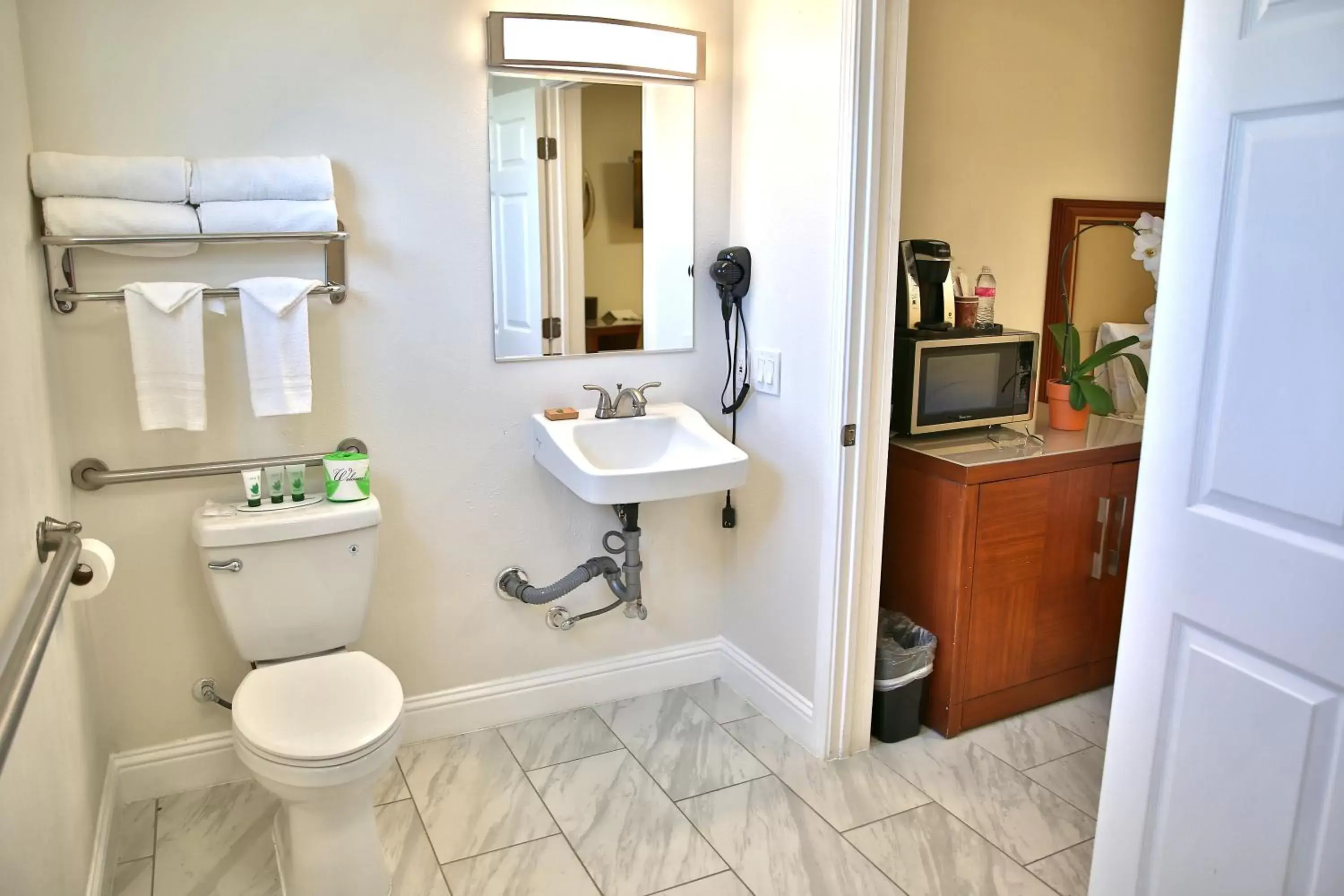 Toilet, Bathroom in Travelodge by Wyndham Crescent City