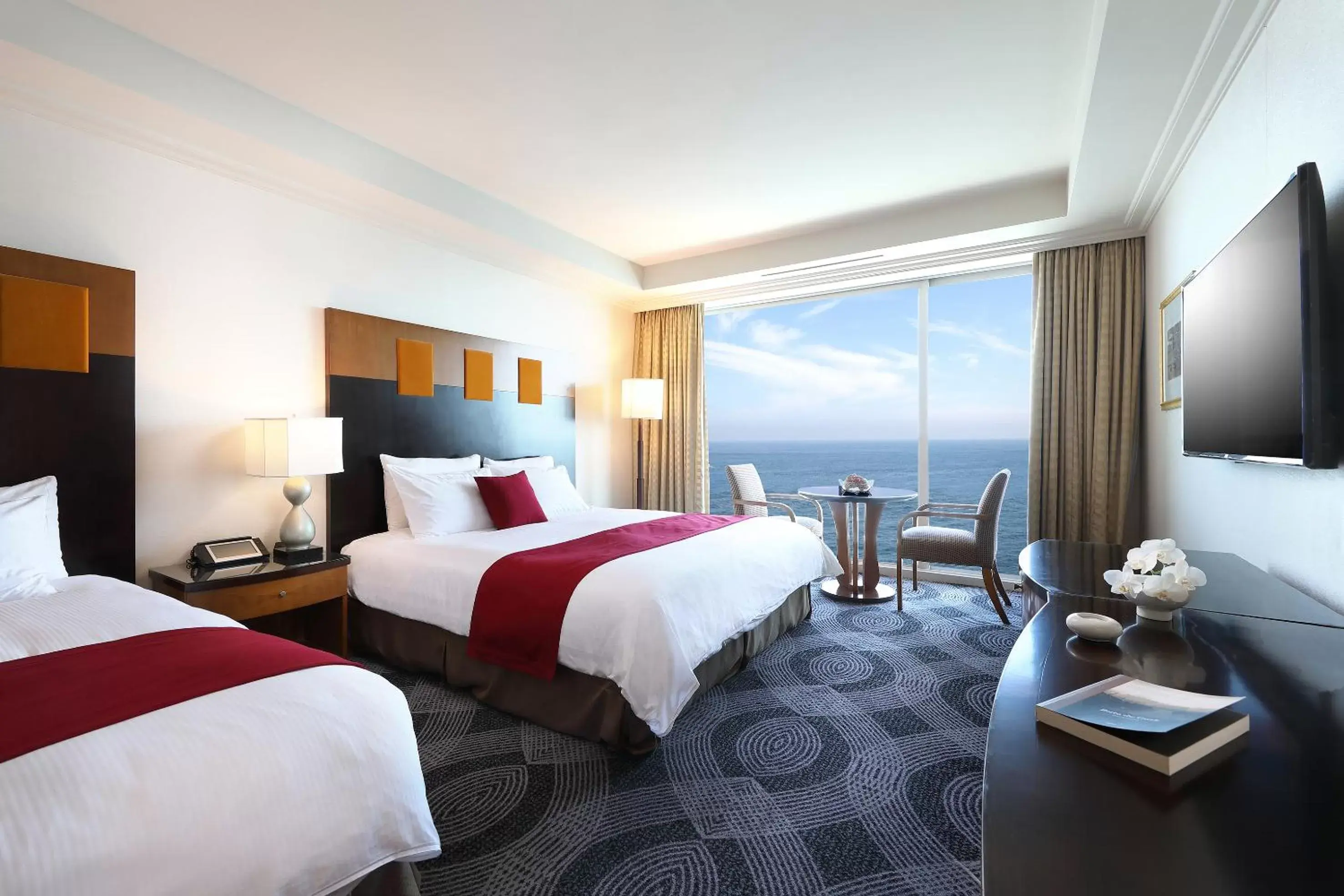 Photo of the whole room in Ramada Plaza by Wyndham Jeju Ocean Front Photo of the whole room in Ramada Plaza by Wyndham Jeju Ocean Front