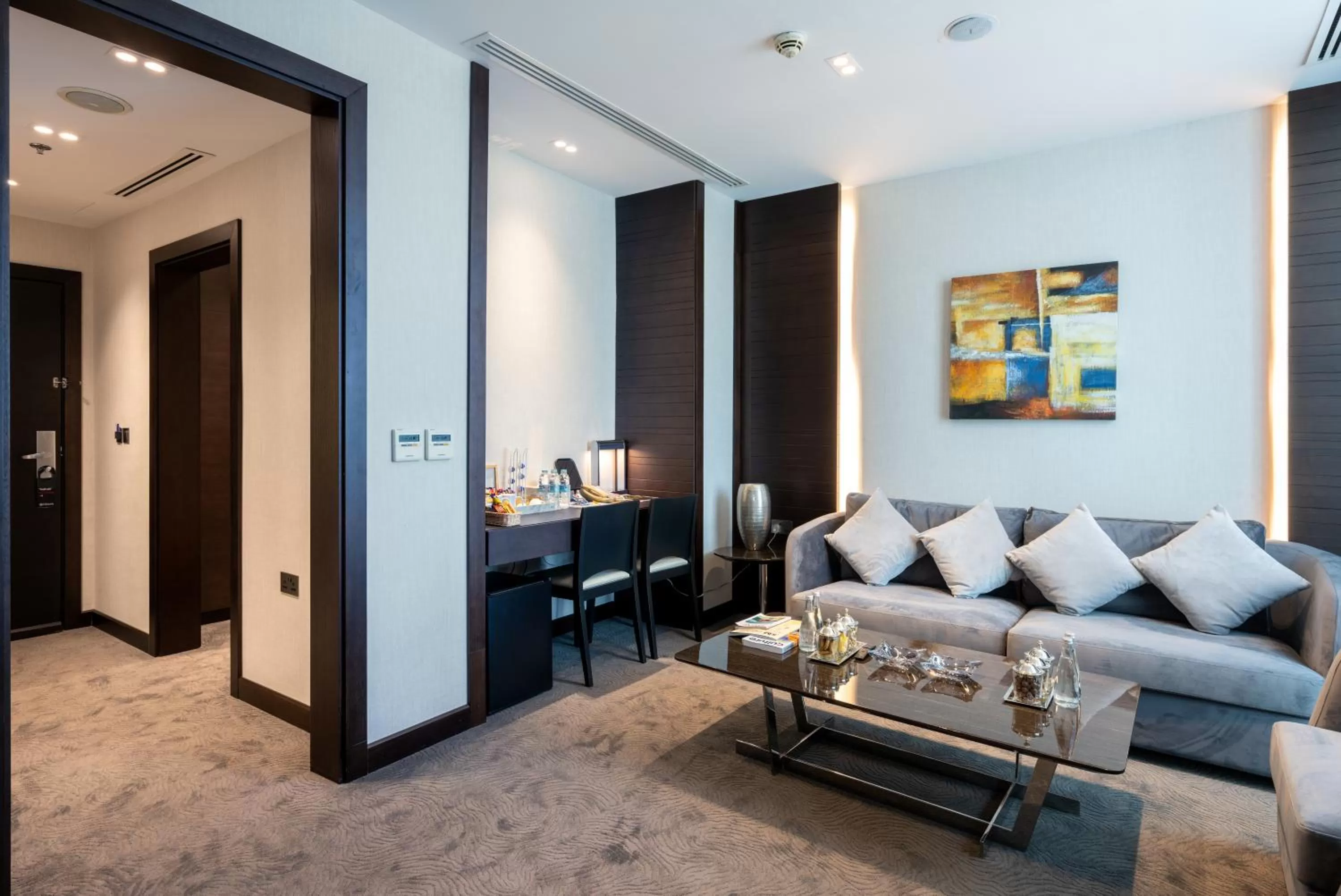 Living room in Ramada Encore Doha by Wyndham