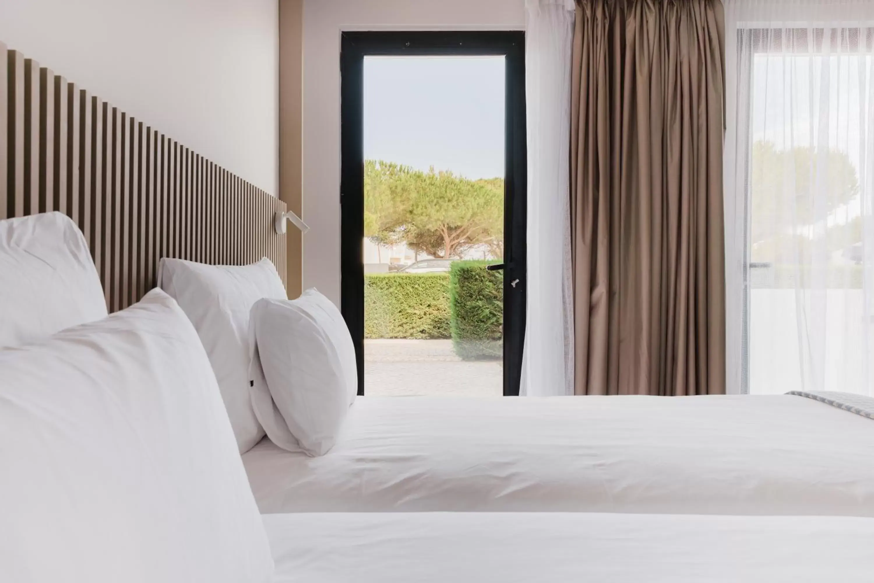 View (from property/room), Bed in Memmo Baleeira - Design Hotels