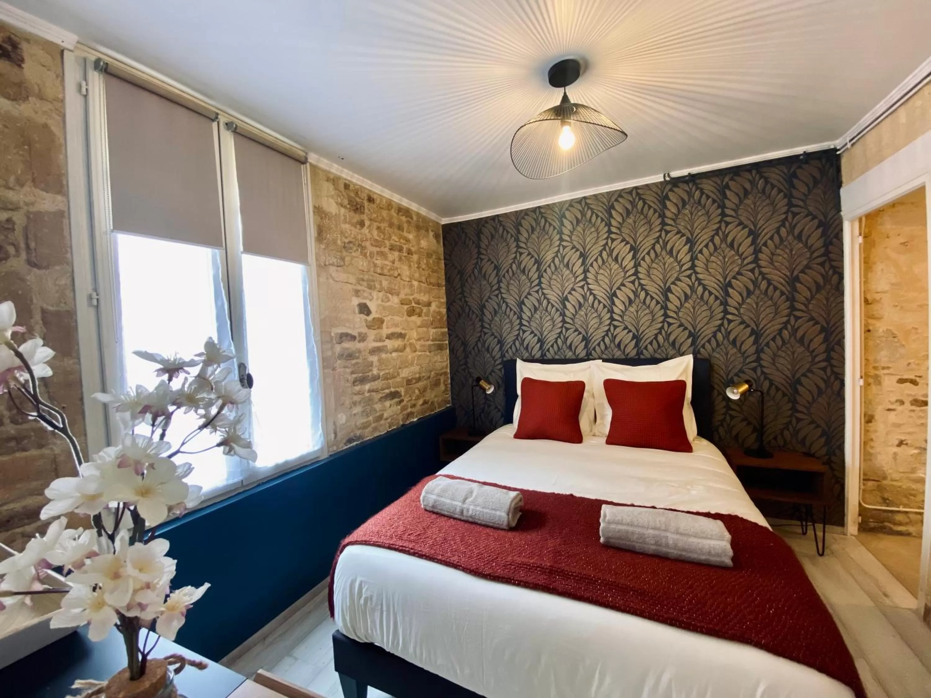 Bedroom, Bed in Chambres d'hôtes Le Maroni