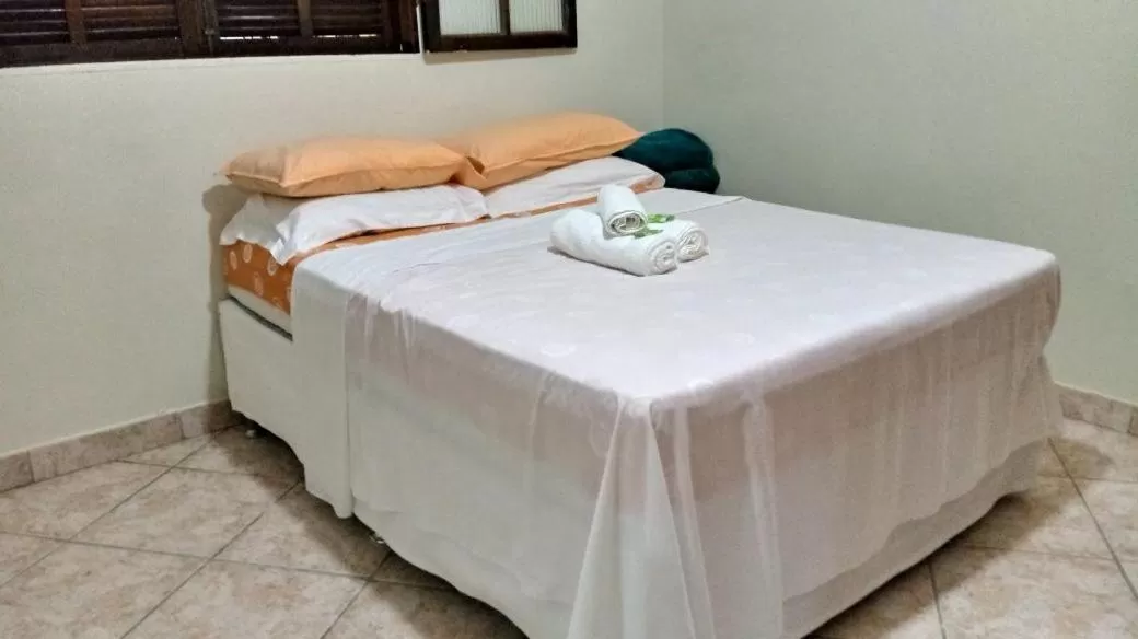 Bed in Pousada da Rose Paraty
