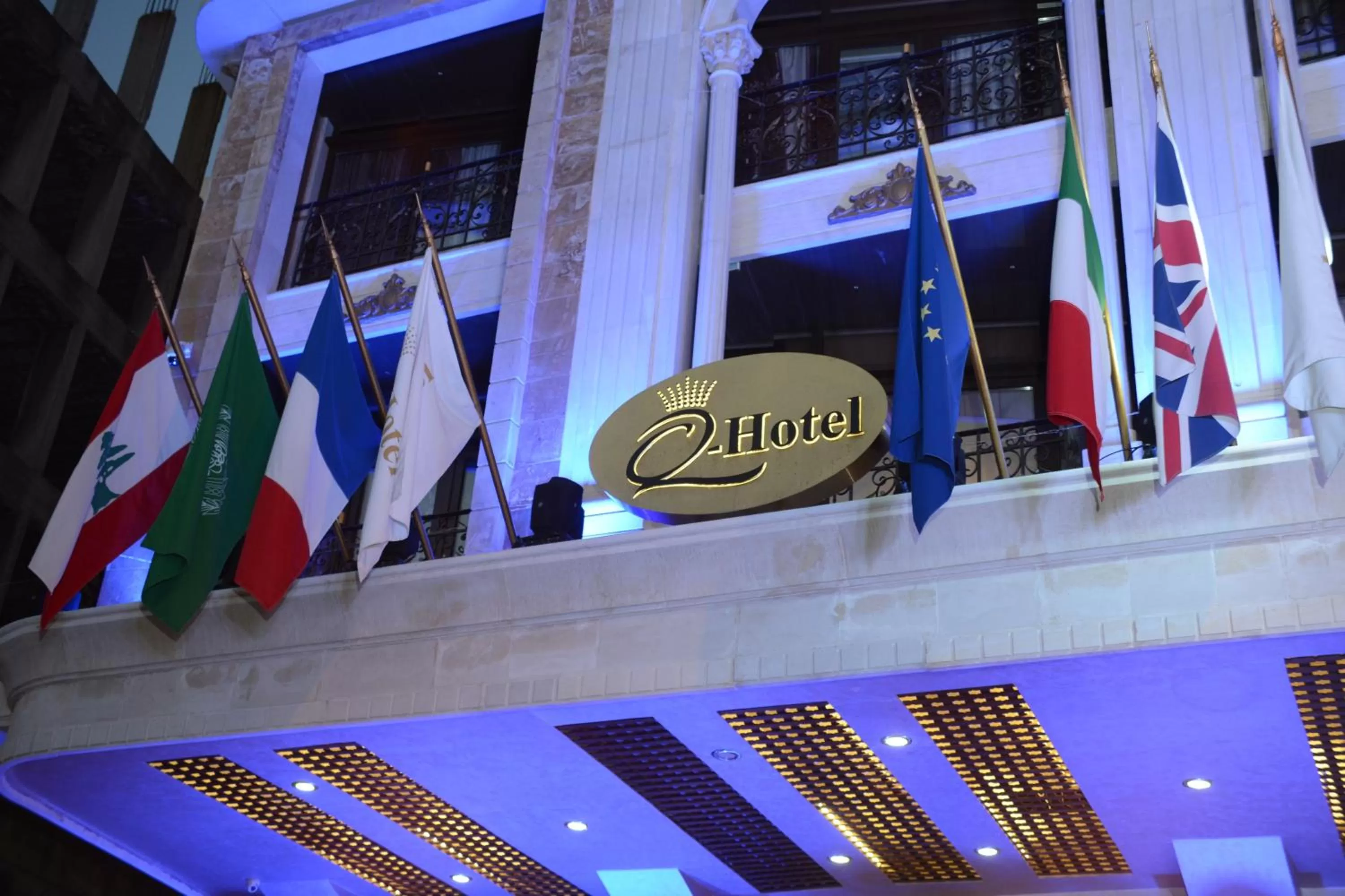 Property logo or sign in Q Hotel