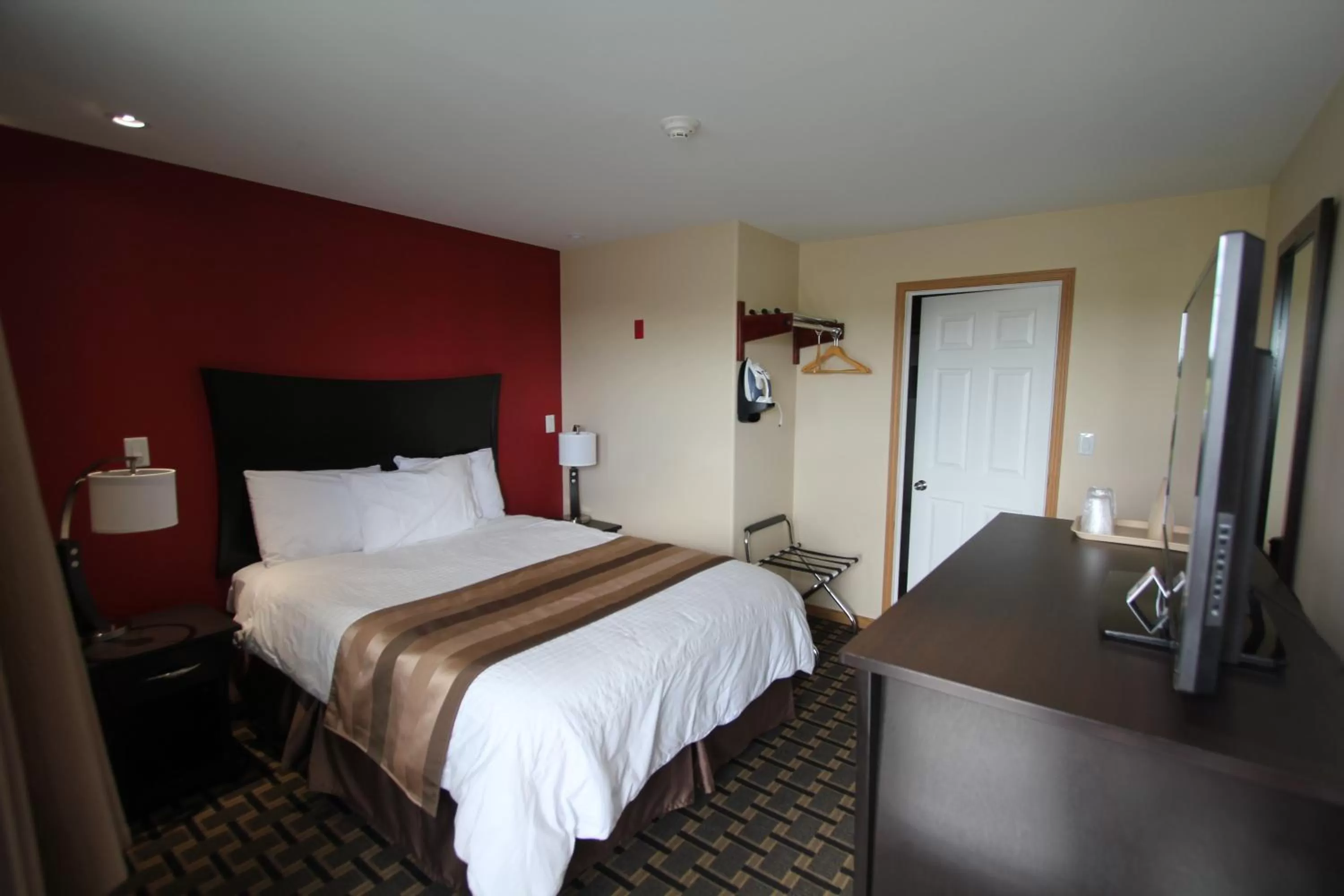 Bed in Masterson's Motel