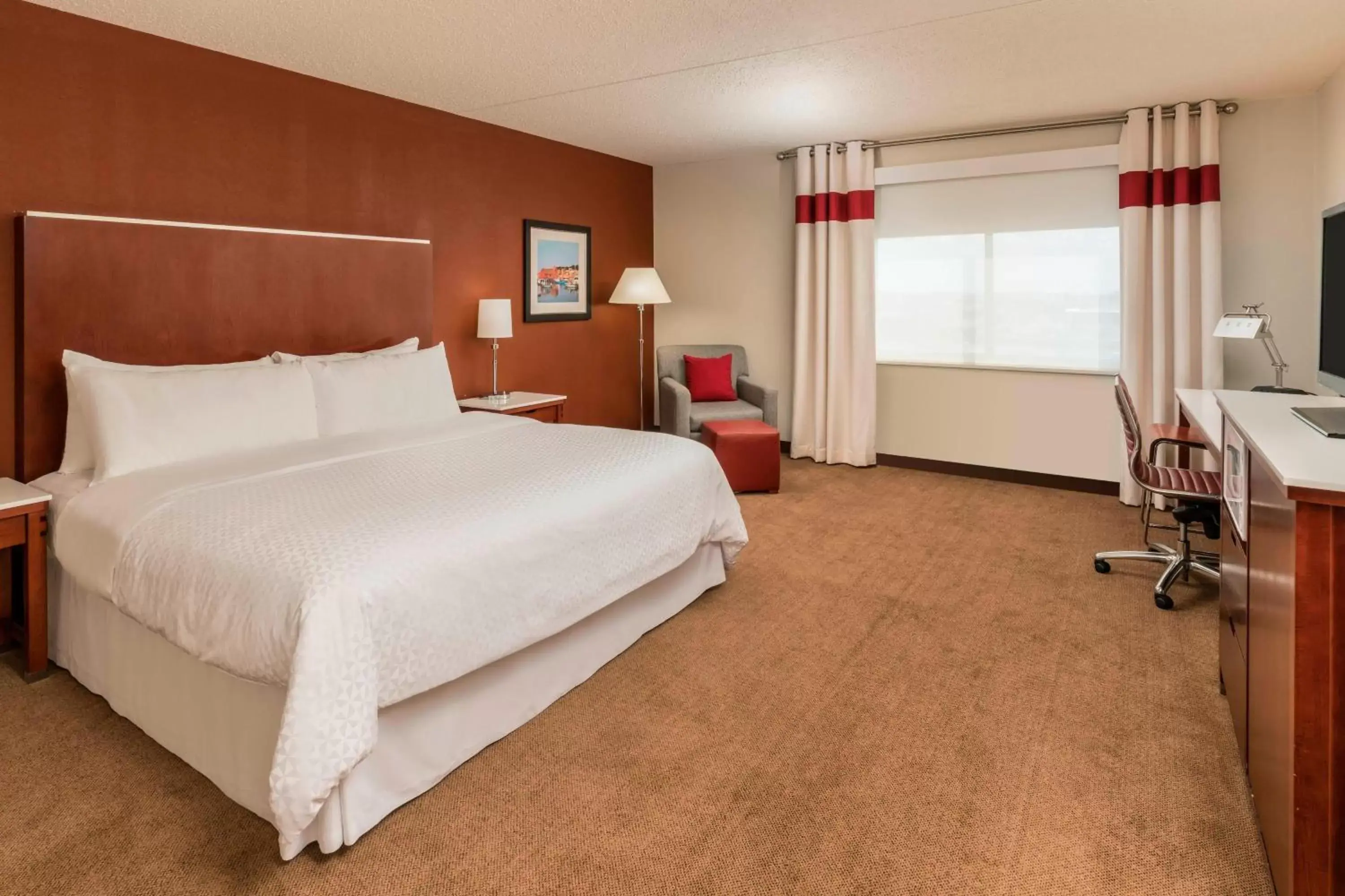 Photo of the whole room, Bed in Four Points by Sheraton Boston Logan Airport Revere