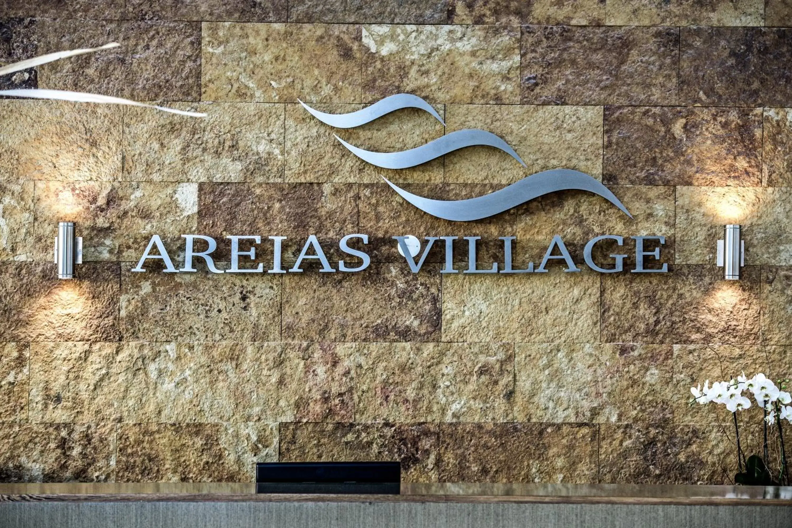 Property logo or sign in Areias Village Beach Suite Hotel