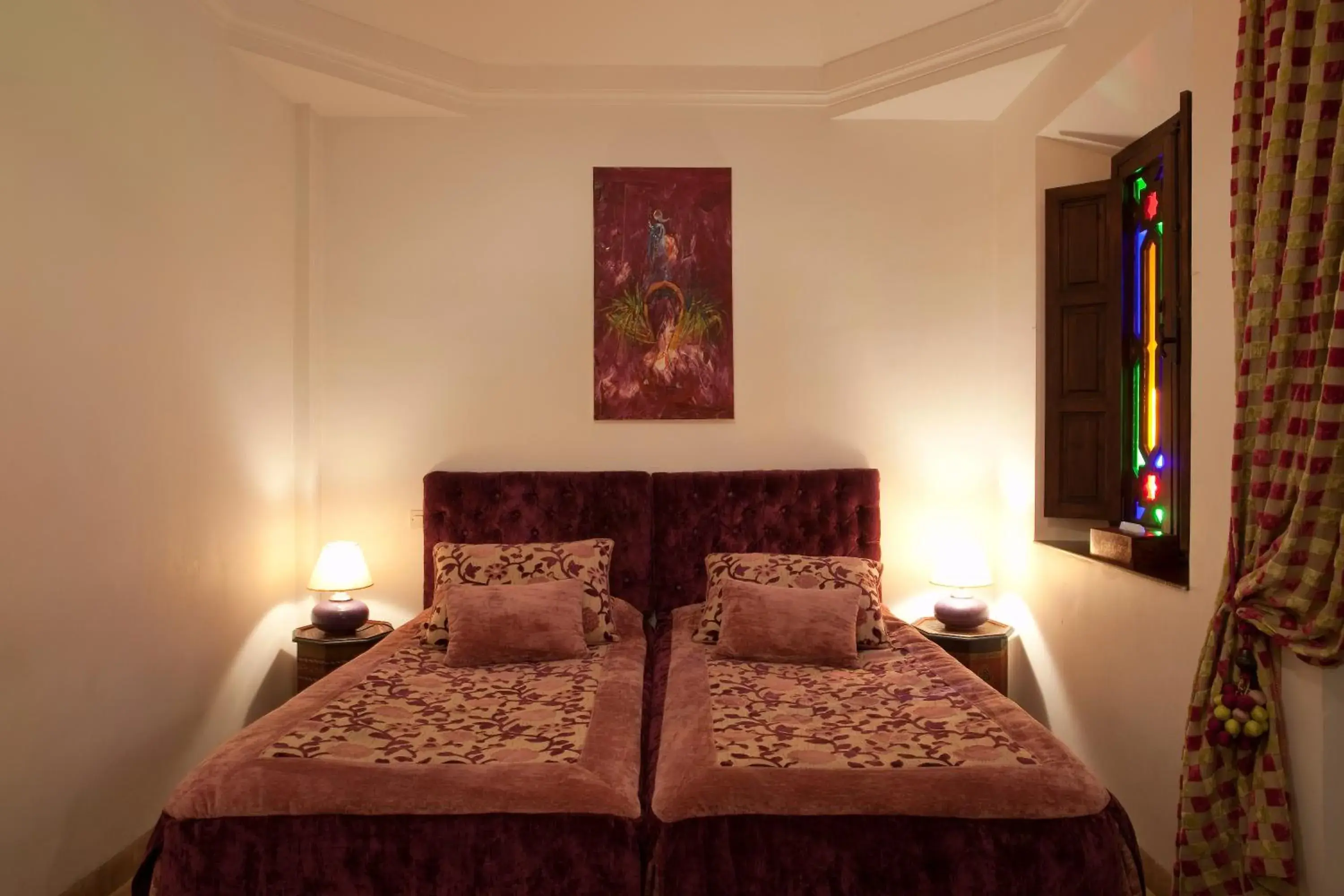 Bed in Riad Aubrac