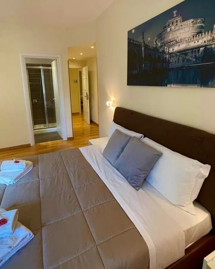 Bed in Rienzo Vatican Suites