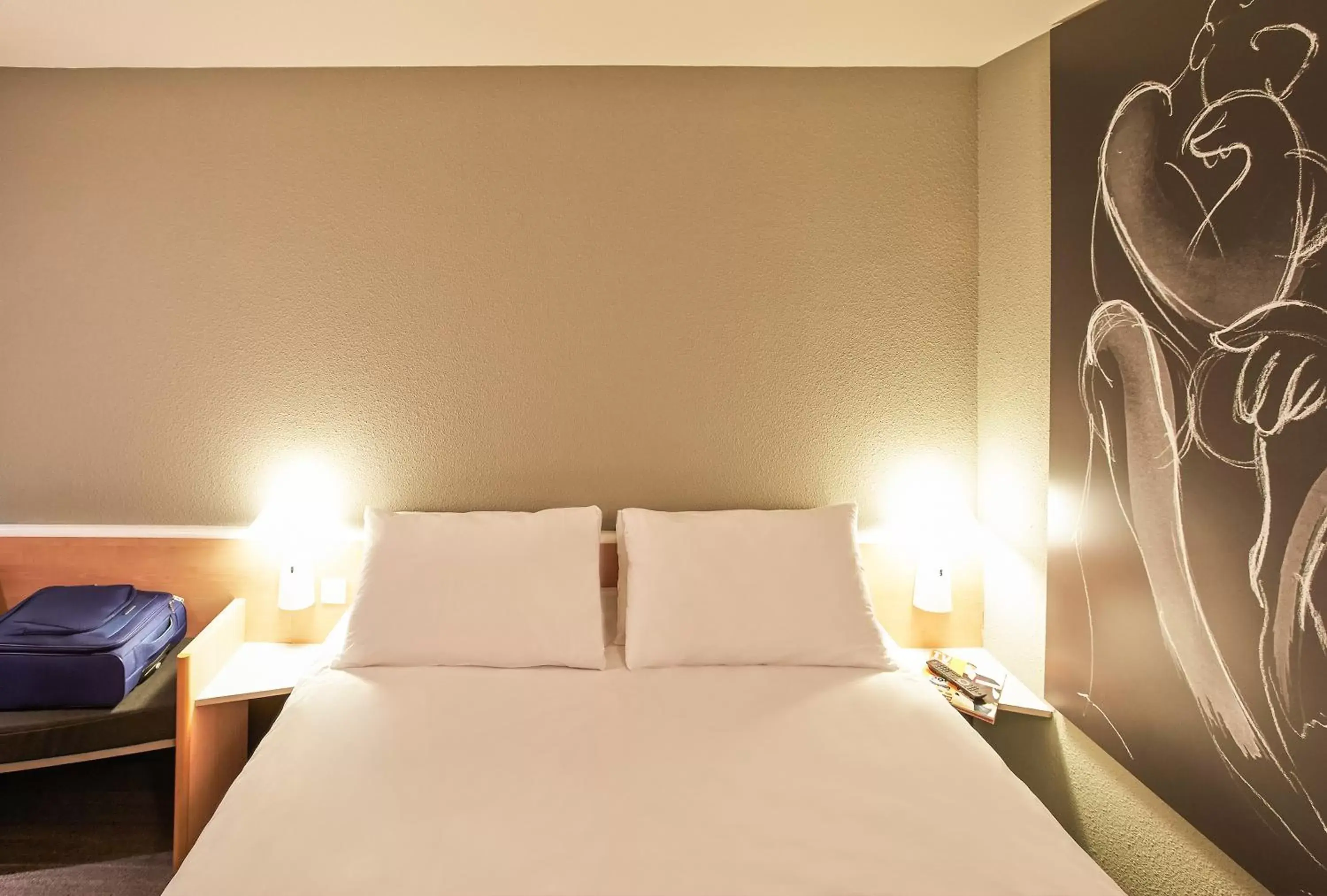 Bed in ibis Mulhouse Ile Napoleon