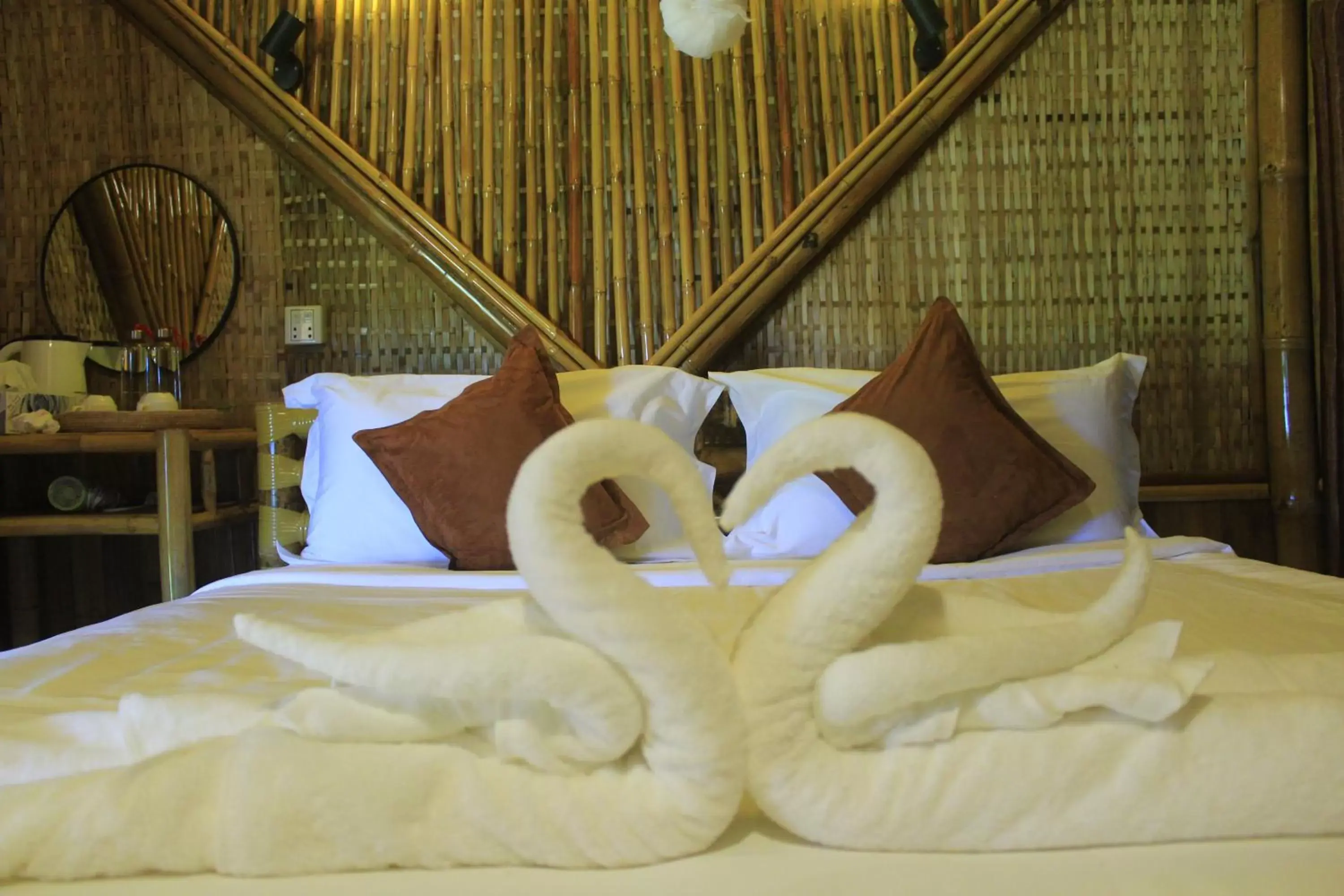 Bed in Hanchey Bamboo Resort Bed in Hanchey Bamboo Resort