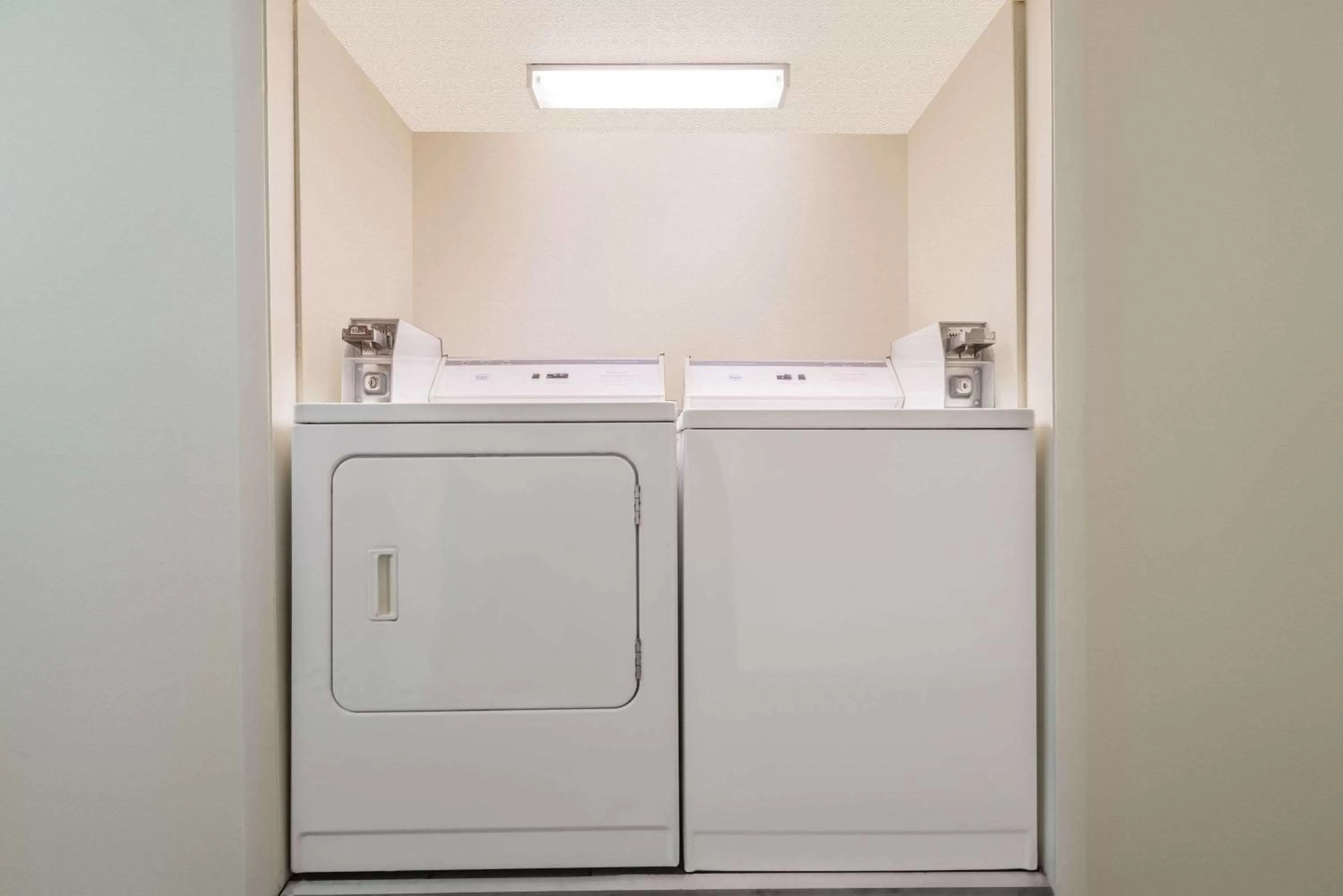 laundry in Super 8 by Wyndham Topeka/Wanamaker RD/I-70