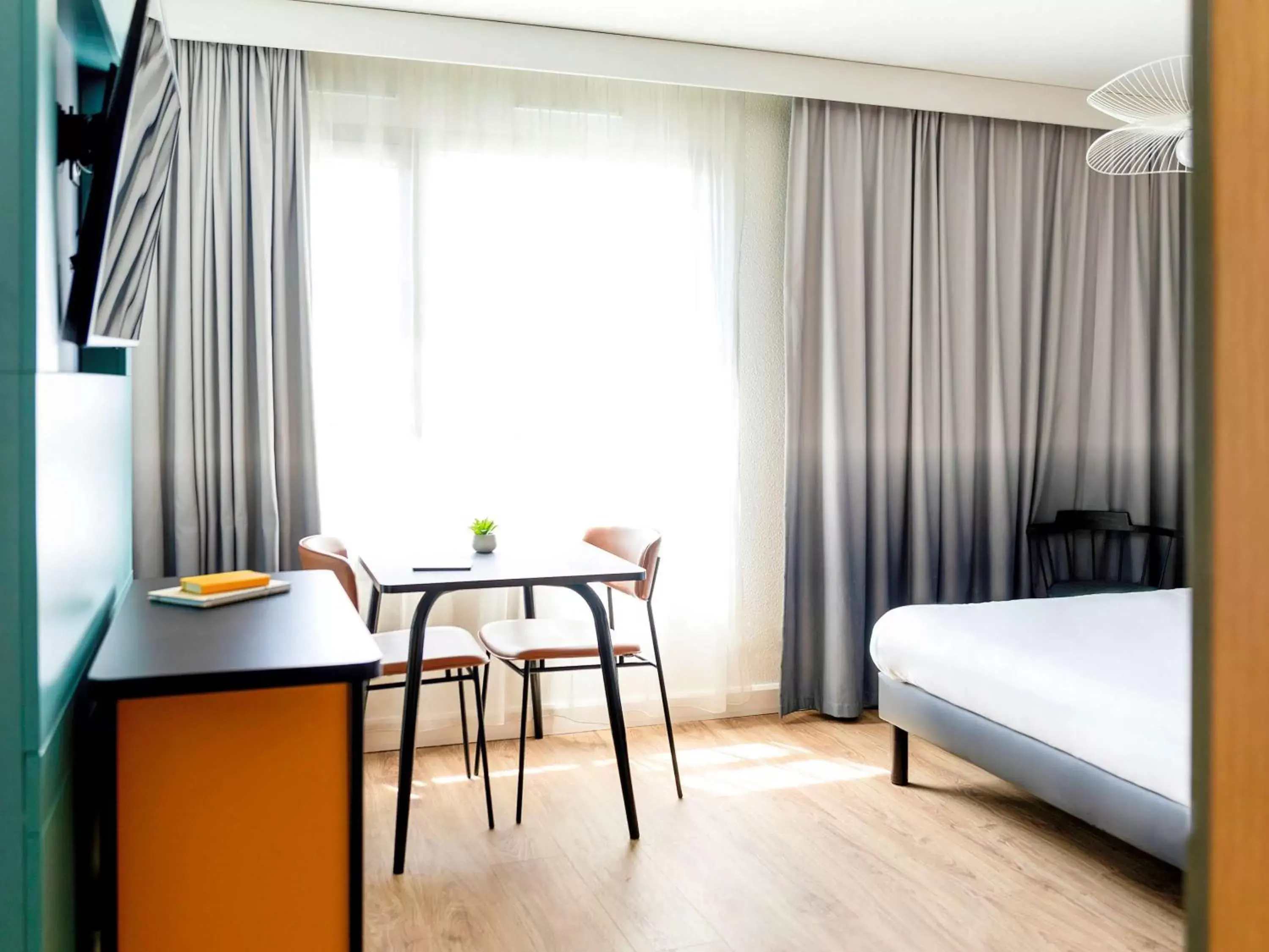 Photo of the whole room, Bed in Aparthotel Adagio Annecy Centre