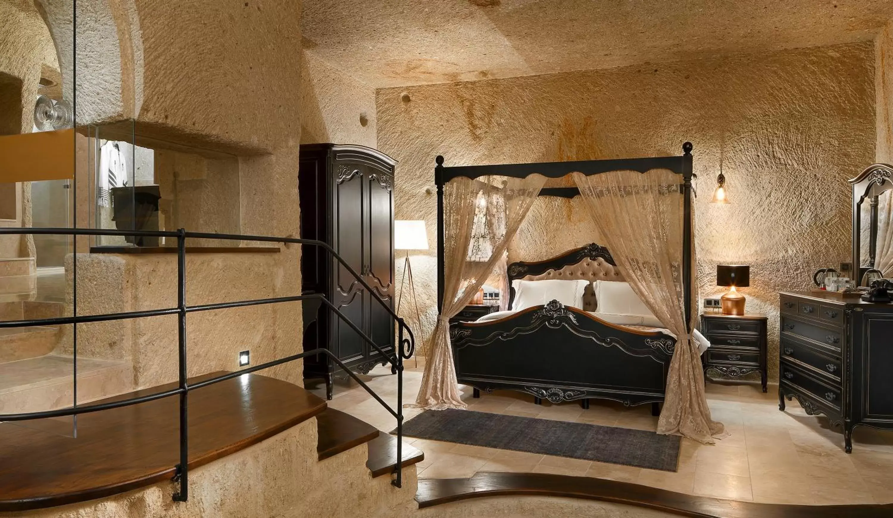 Bed in Seraphim Cave Suites & SPA