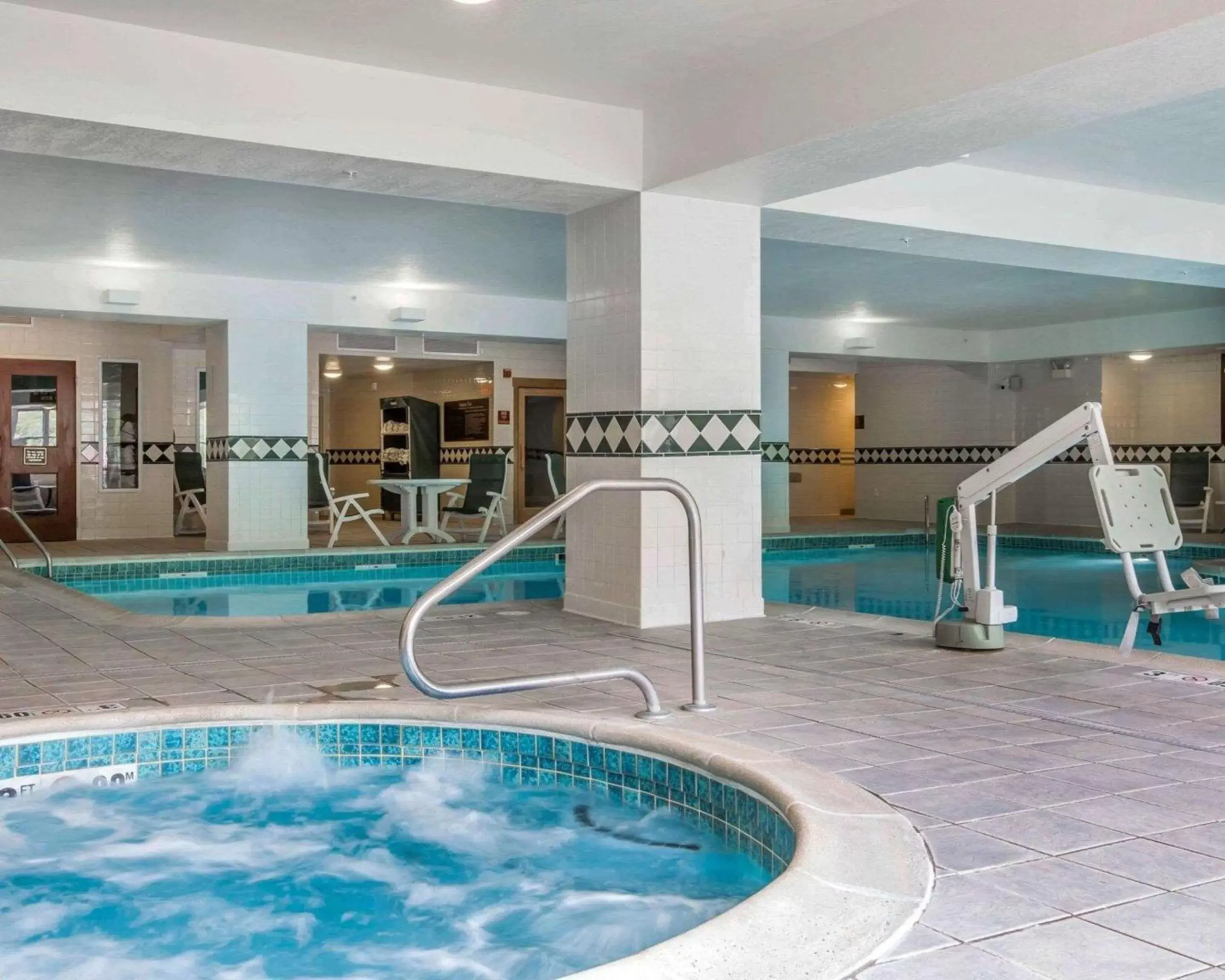 On site, Swimming Pool in Comfort Inn & Suites Near Burke Mountain