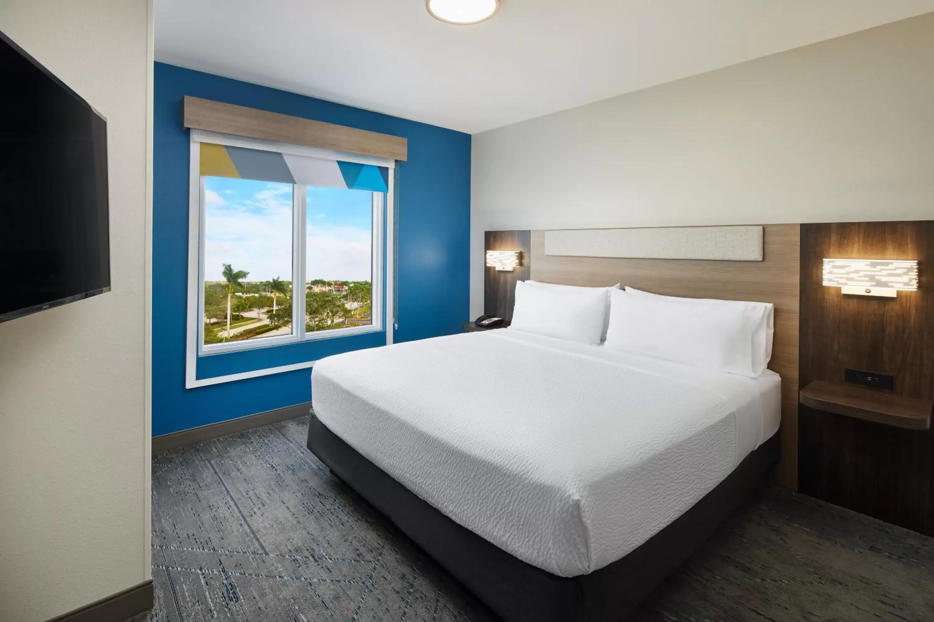 Bedroom, Bed in Holiday Inn Express Hotel & Suites Port St. Lucie West, an IHG Hotel