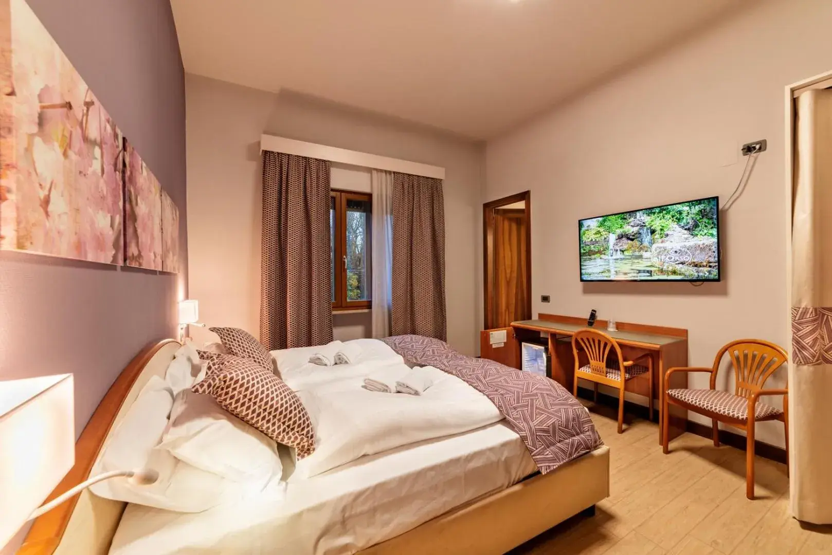 Bedroom, TV/Entertainment Center in Hotel all'Orso