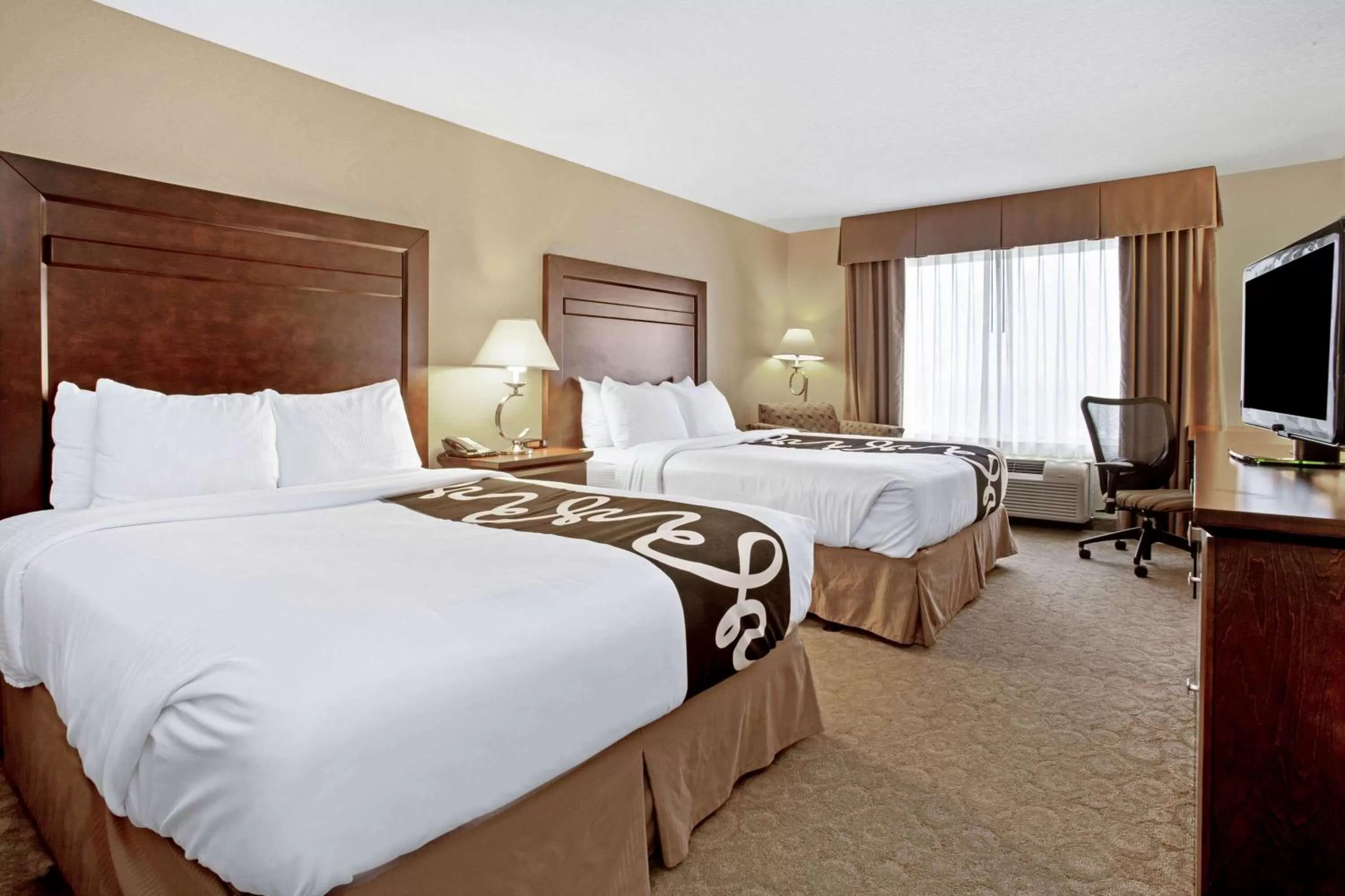 Photo of the whole room, Bed in La Quinta by Wyndham Bismarck