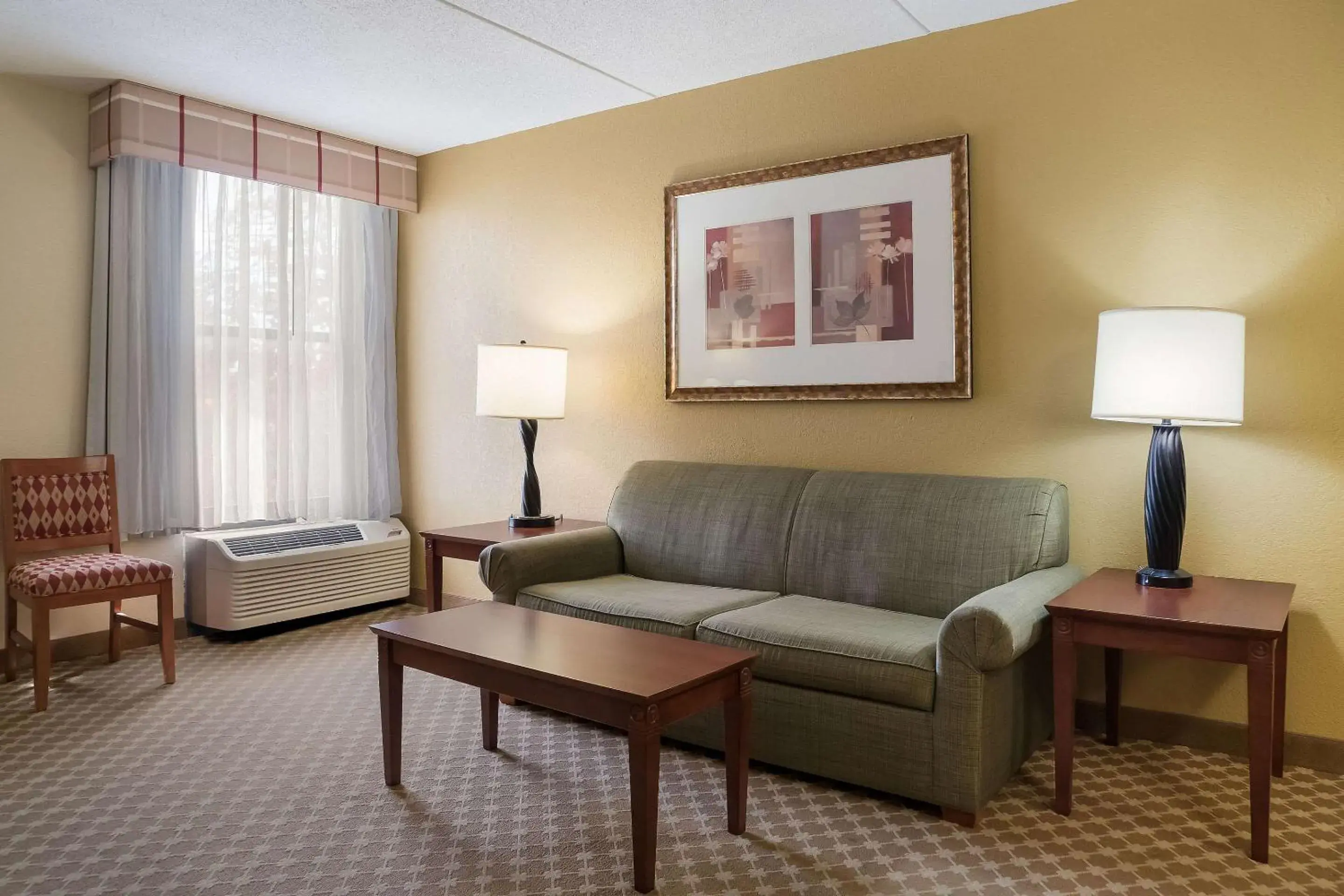 Bedroom, Seating Area in Quality Inn & Suites