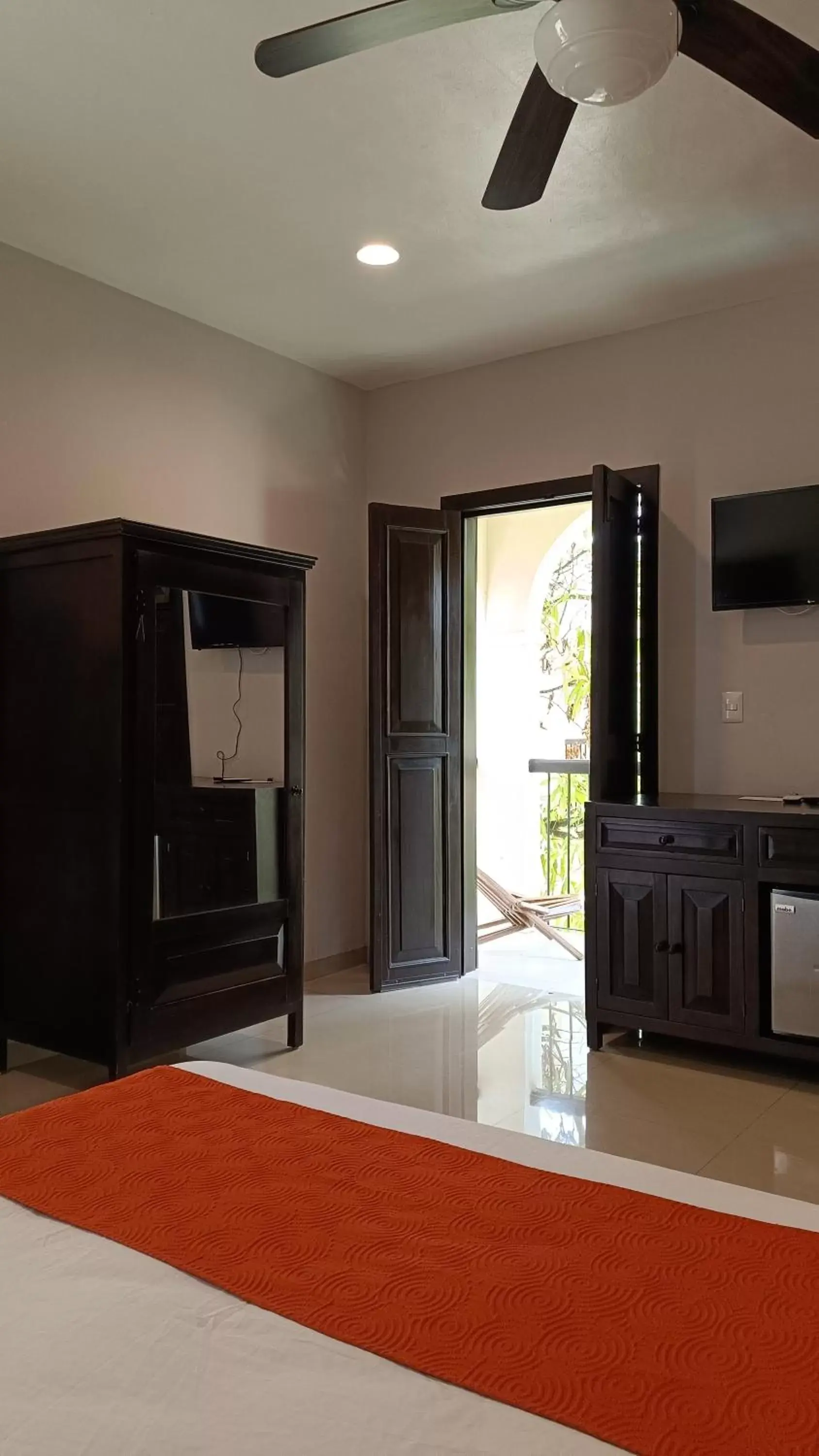 Bedroom, TV/Entertainment Center in Casa Valladolid Boutique Hotel