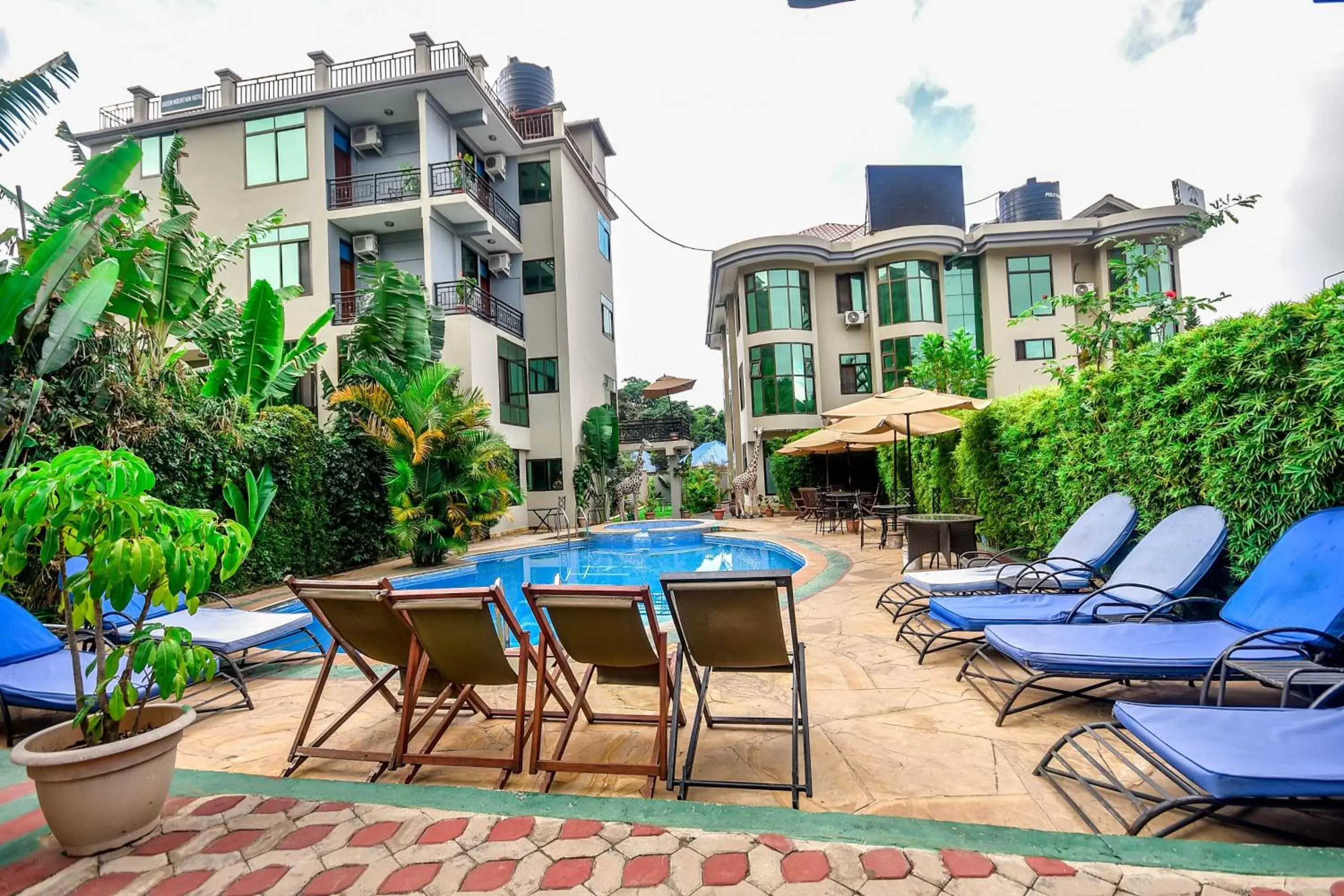 Pool view, Property Building in Green Mountain Hotel