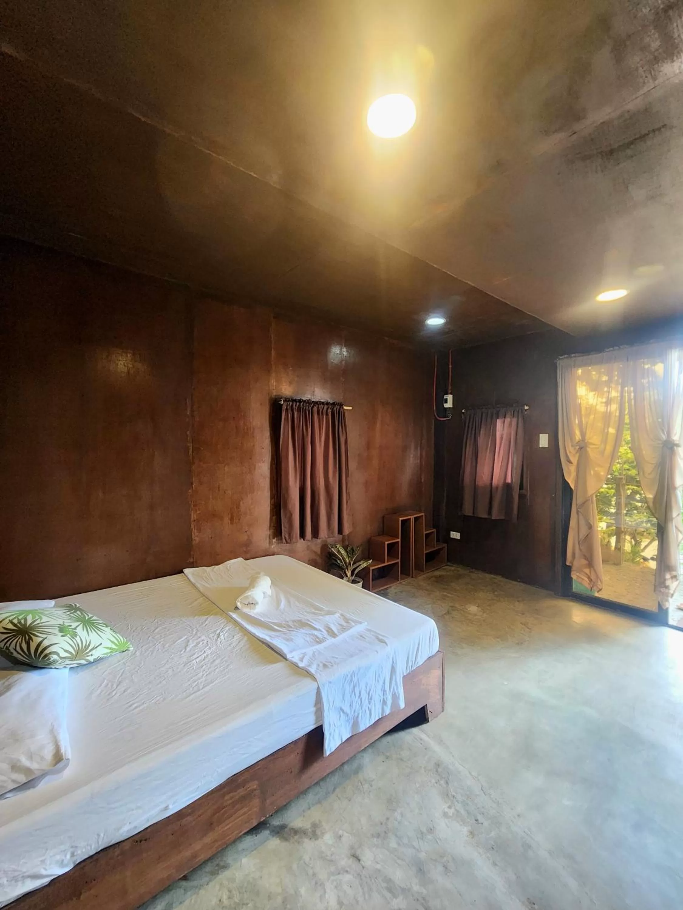 Bed in Cocovana Beach Resort