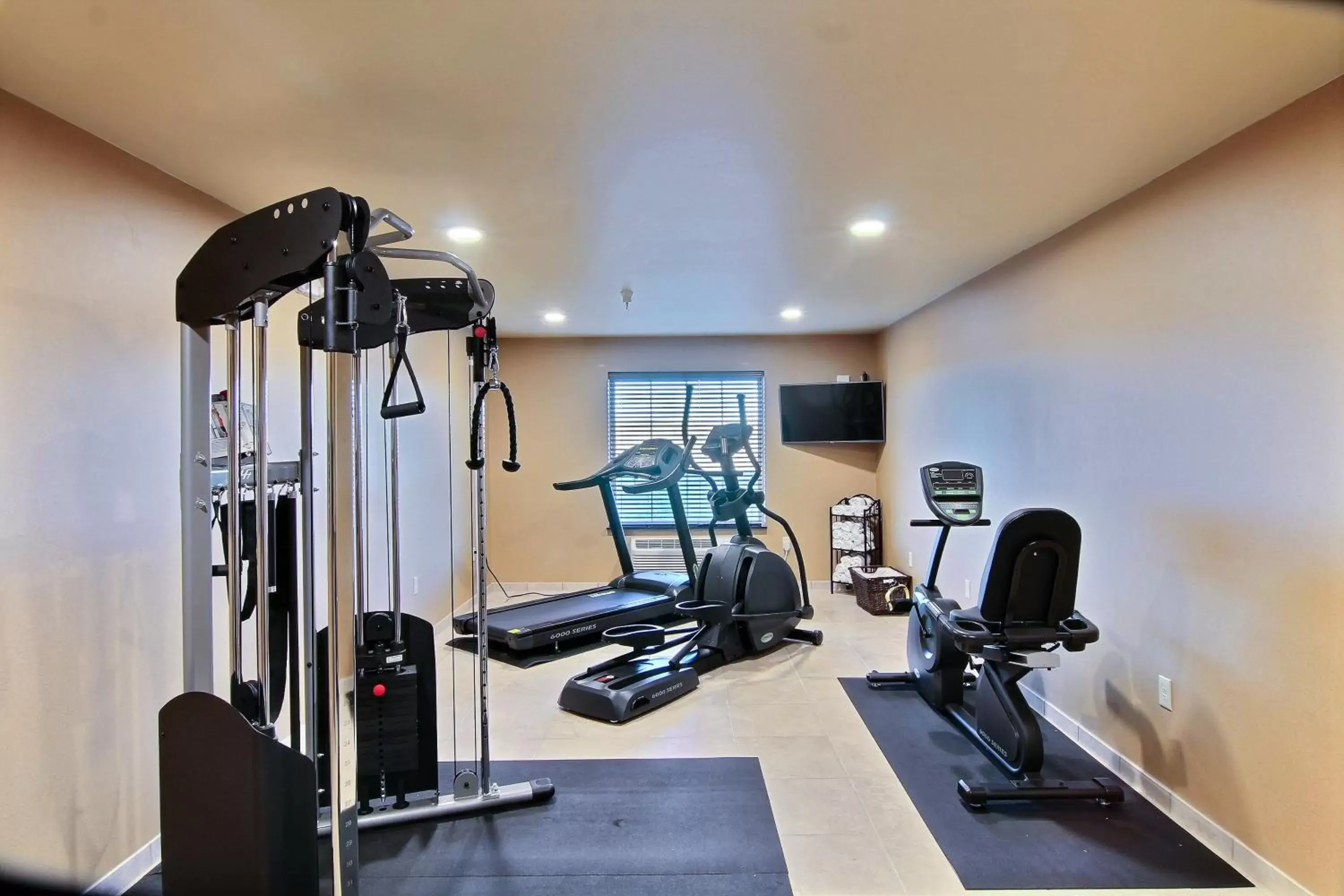 Communal lounge/ TV room, Fitness Center/Facilities in Cobblestone Hotel & Suites - McCook