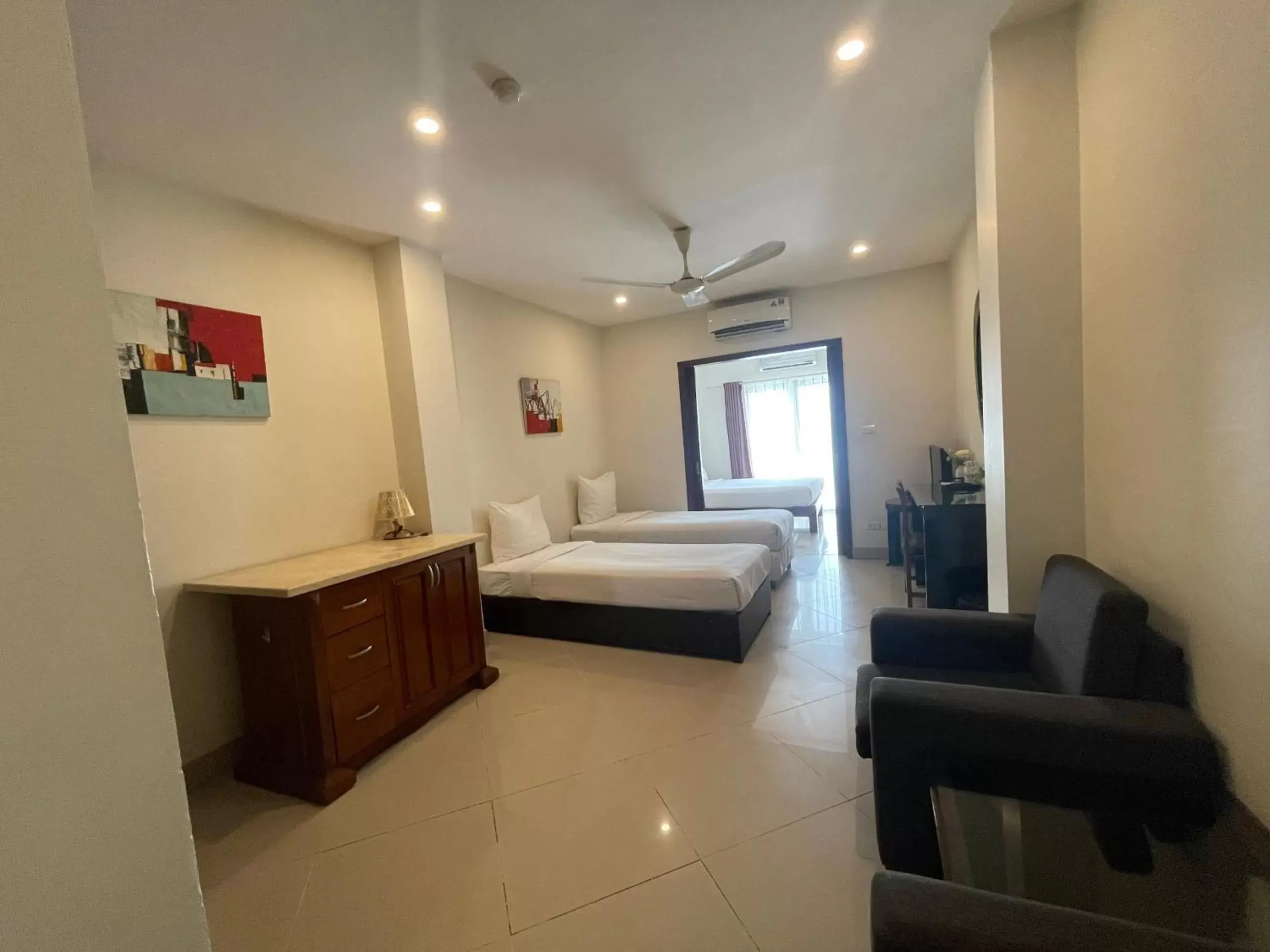 Quadruple Room with Balcony in Rising Dragon Hotel Quadruple Room with Balcony in Rising Dragon Hotel
