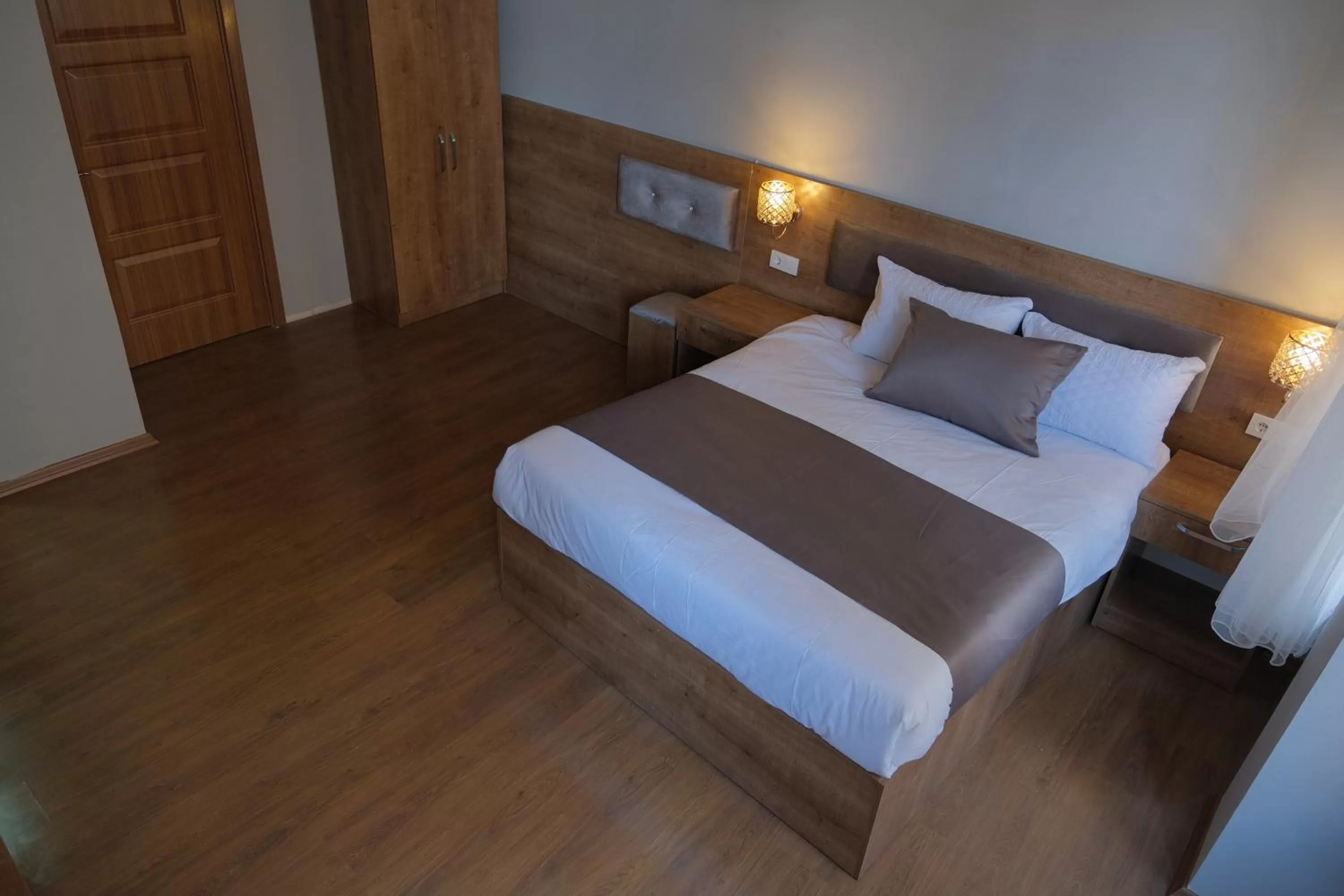 Property building, Bed in Adamantides Hotel