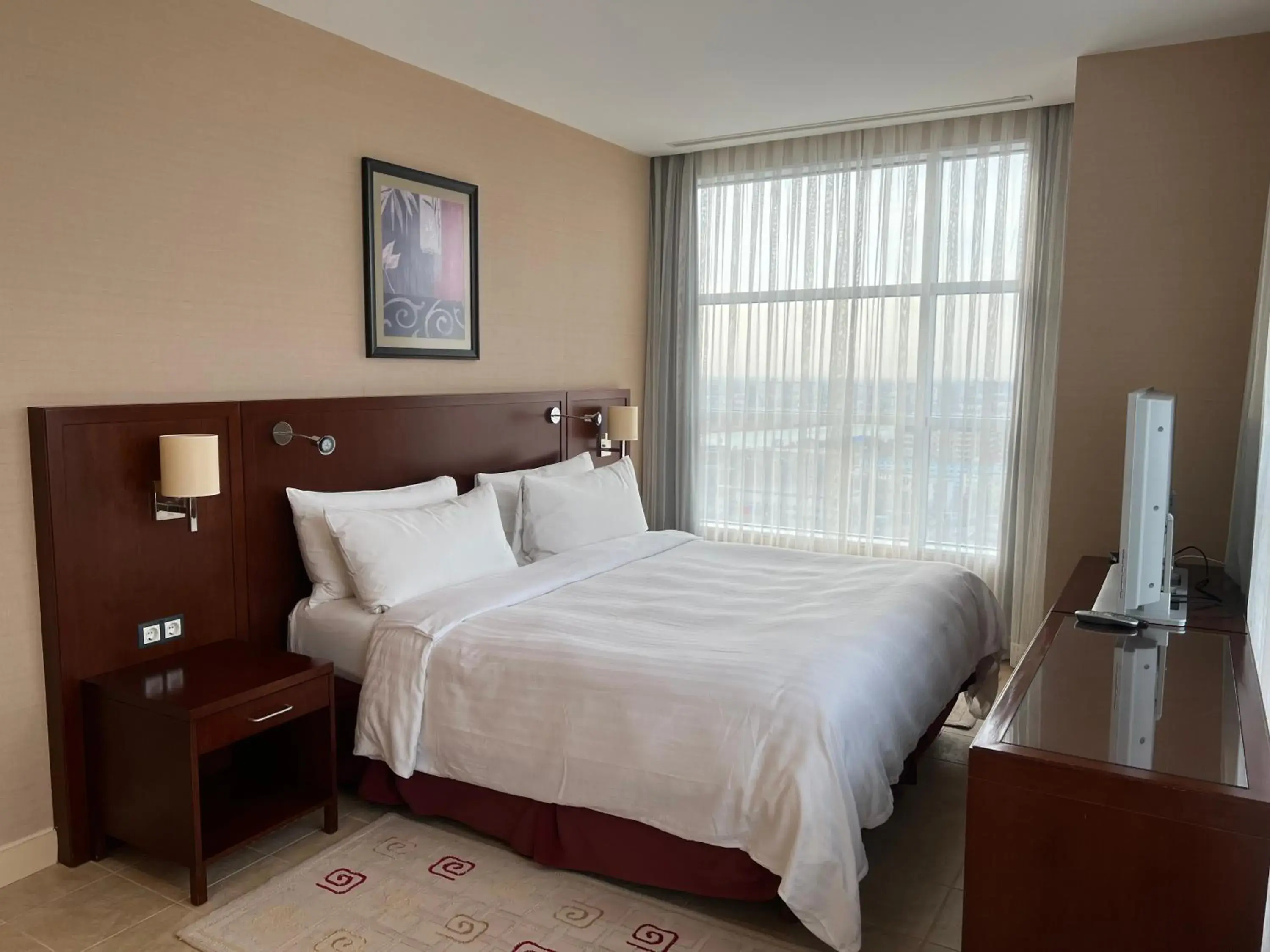 Bed in Marriott Executive Apartments Atyrau