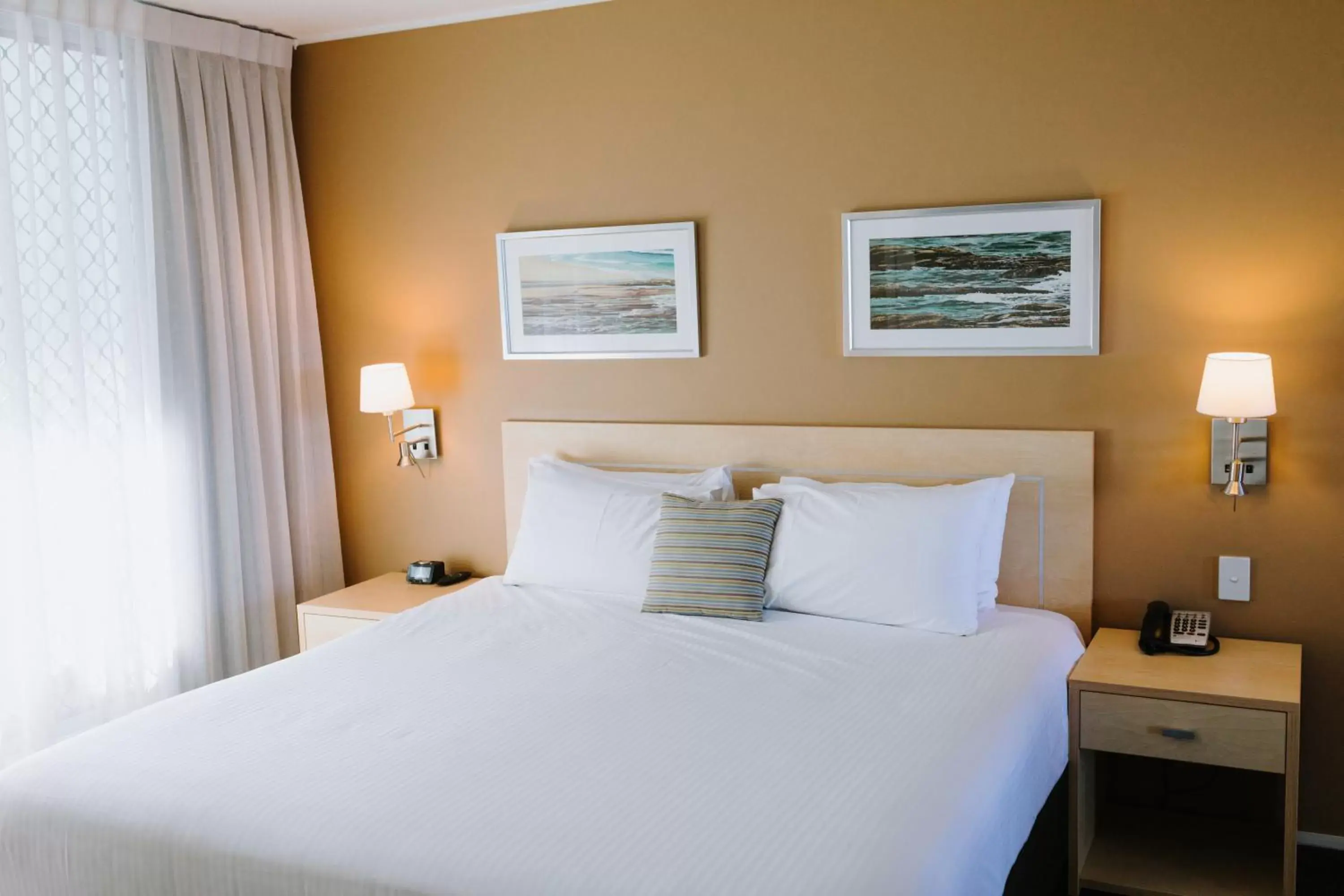 Bed in Ramada Hotel & Suites by Wyndham Ballina Byron