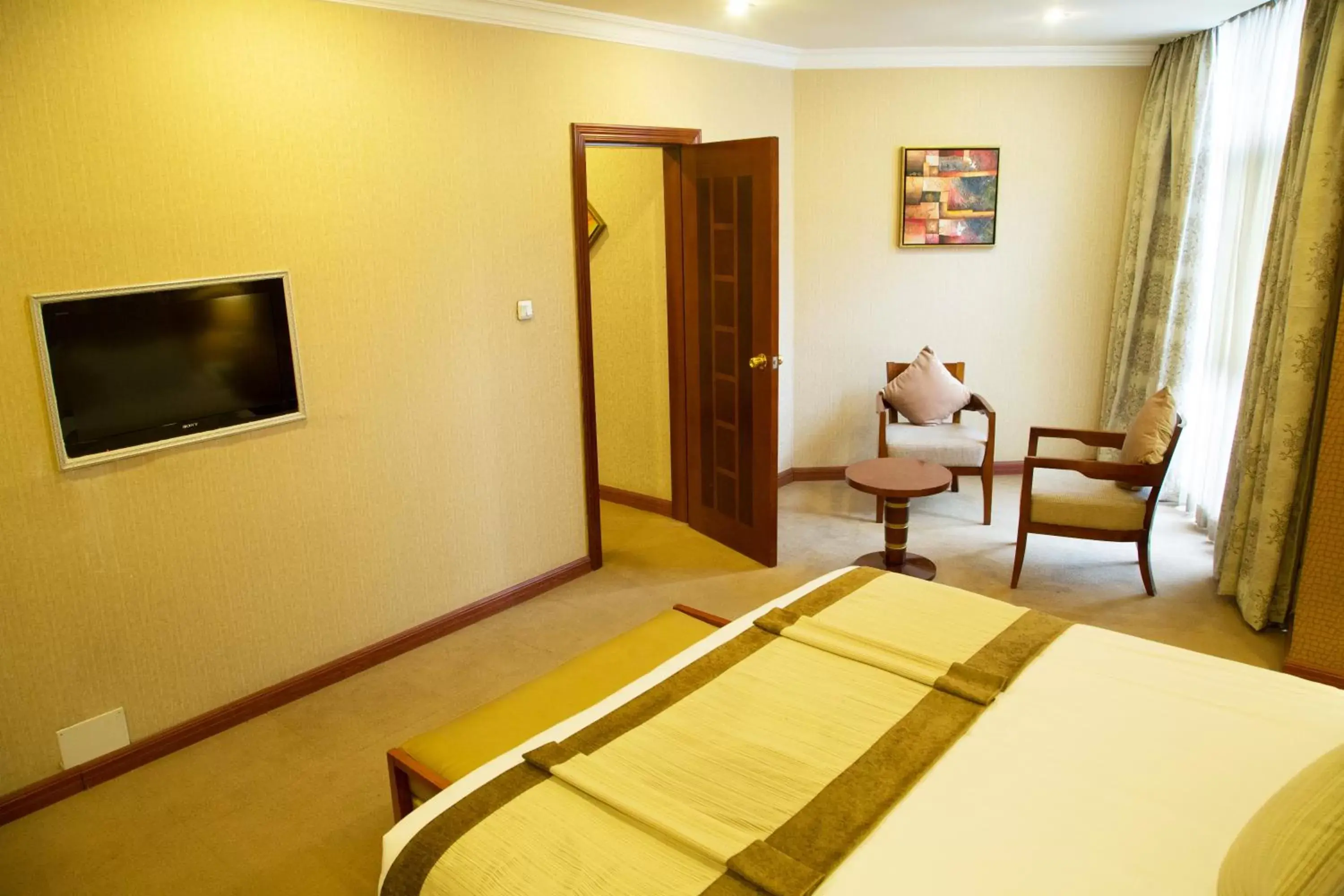 Bedroom, TV/Entertainment Center in Jupiter International Hotel - Cazanchis