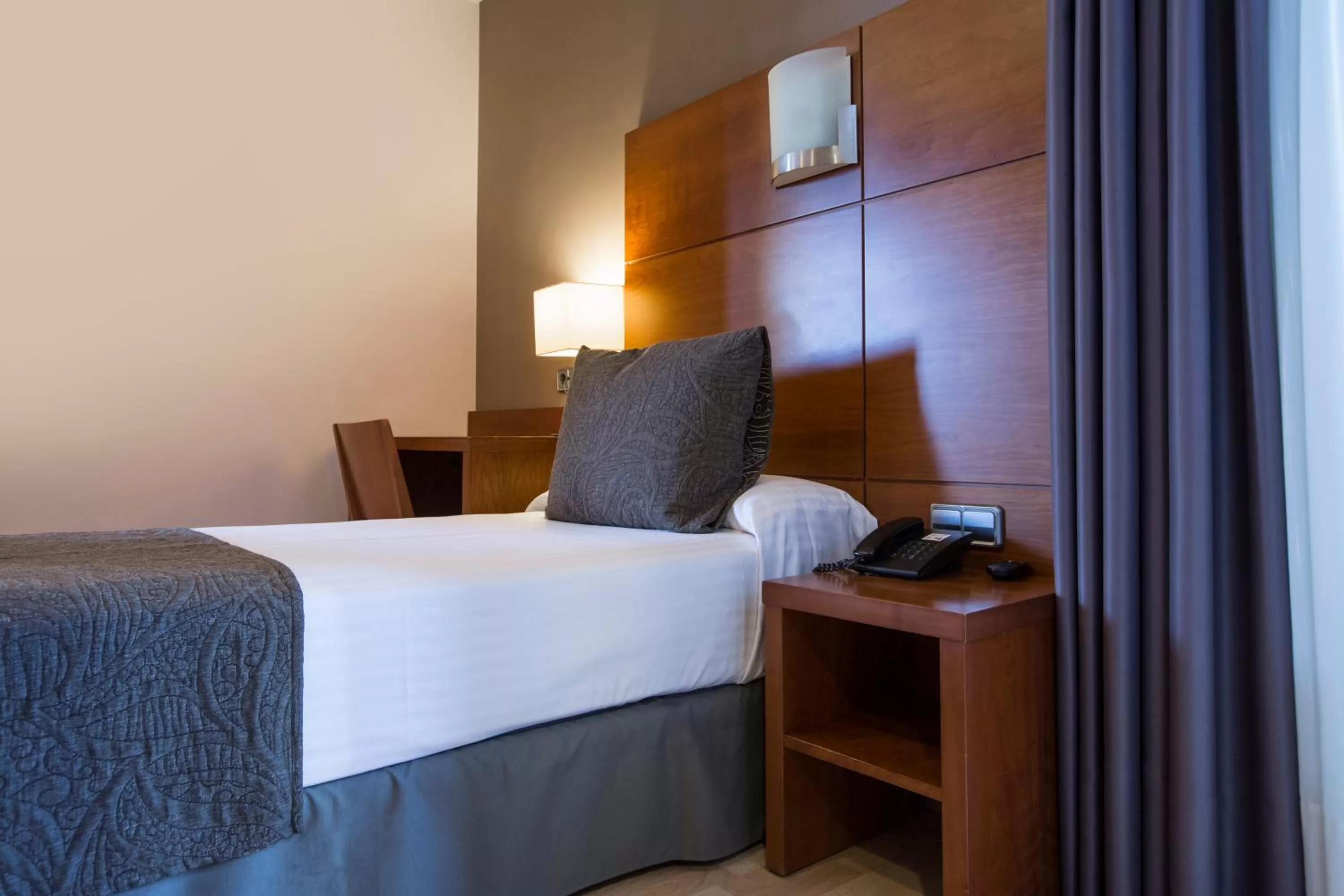 Bed in Hotel Via Augusta