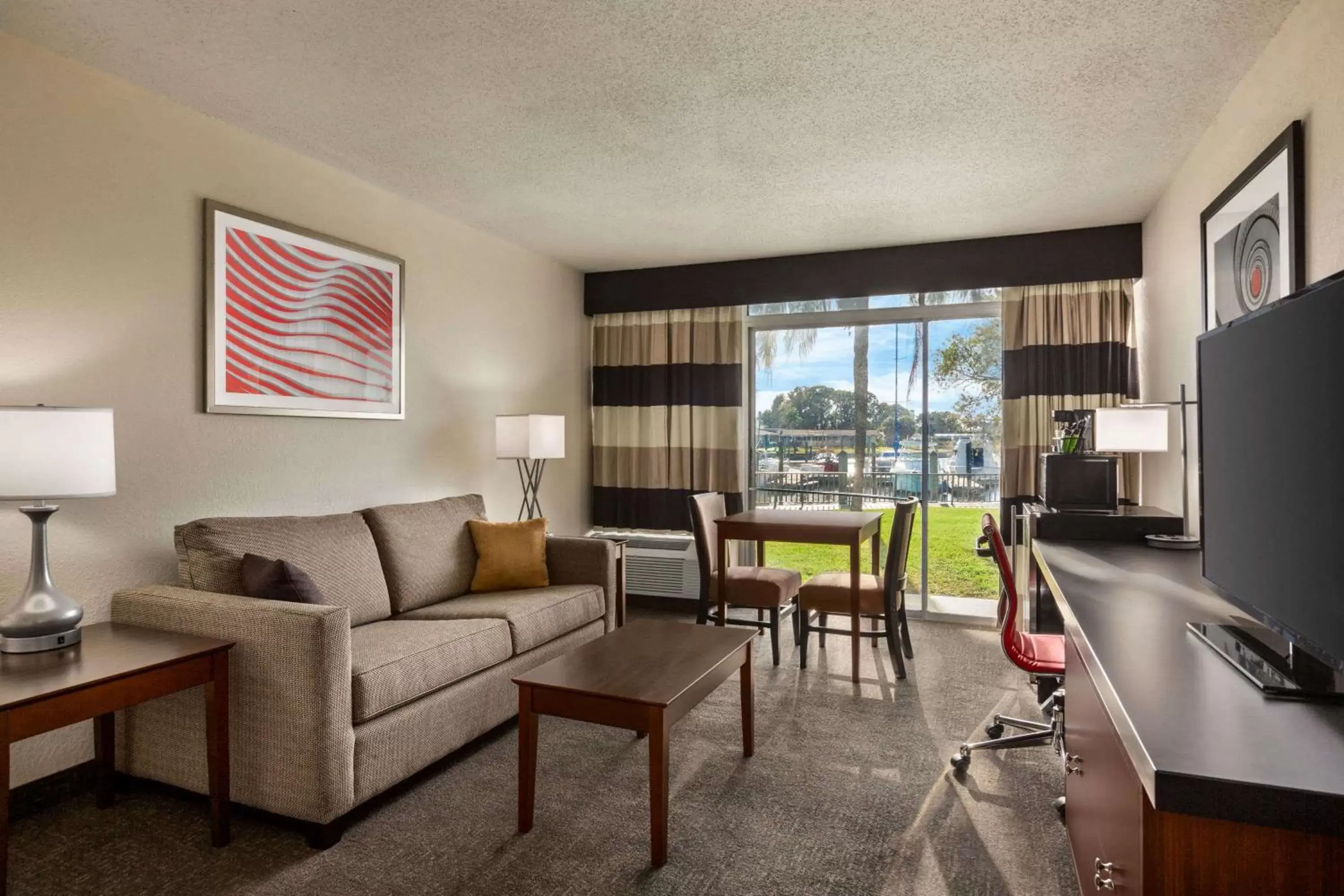 Photo of the whole room, Seating Area in Ramada by Wyndham Sarasota Waterfront