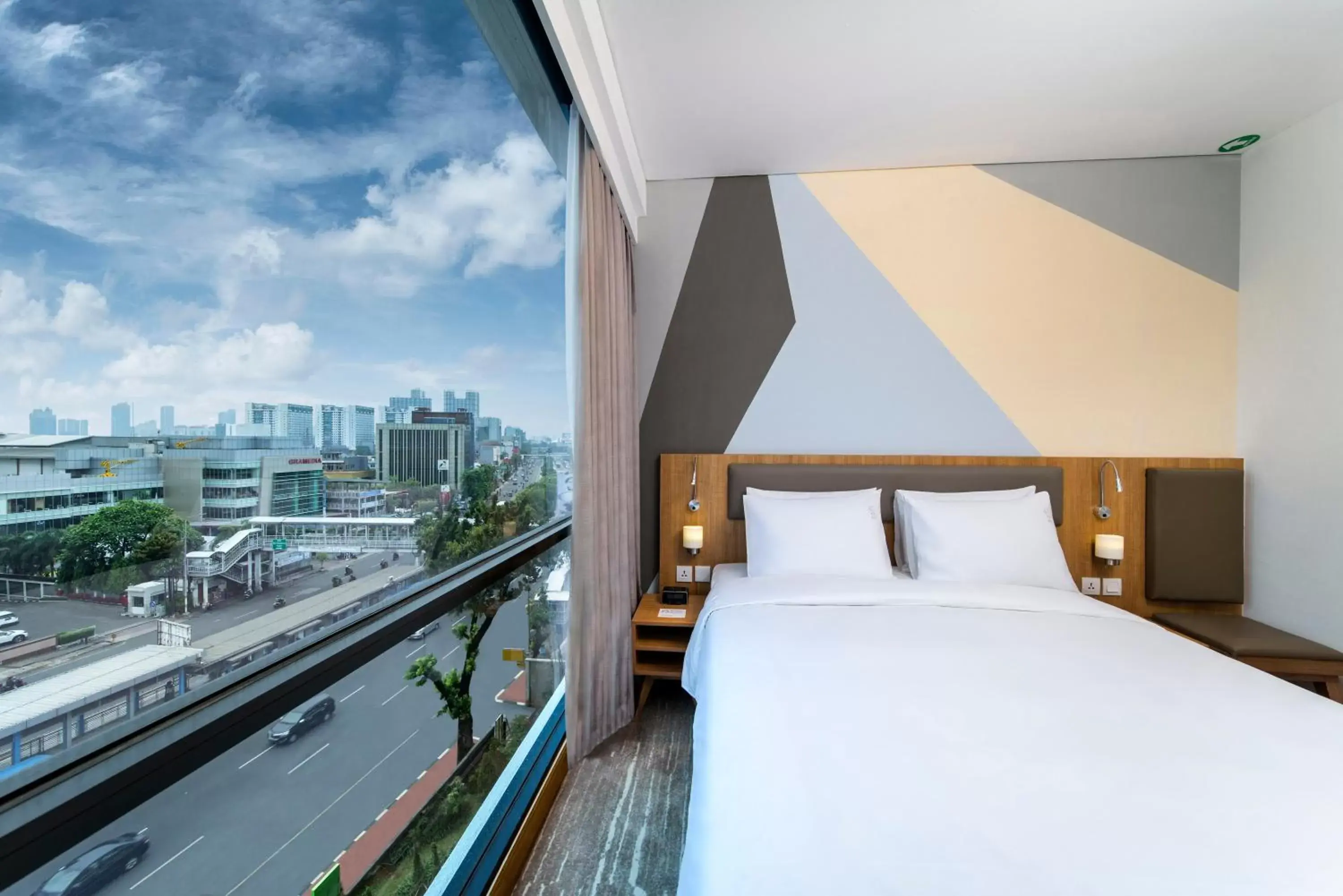 Bedroom in Holiday Inn Express Jakarta Matraman, an IHG Hotel