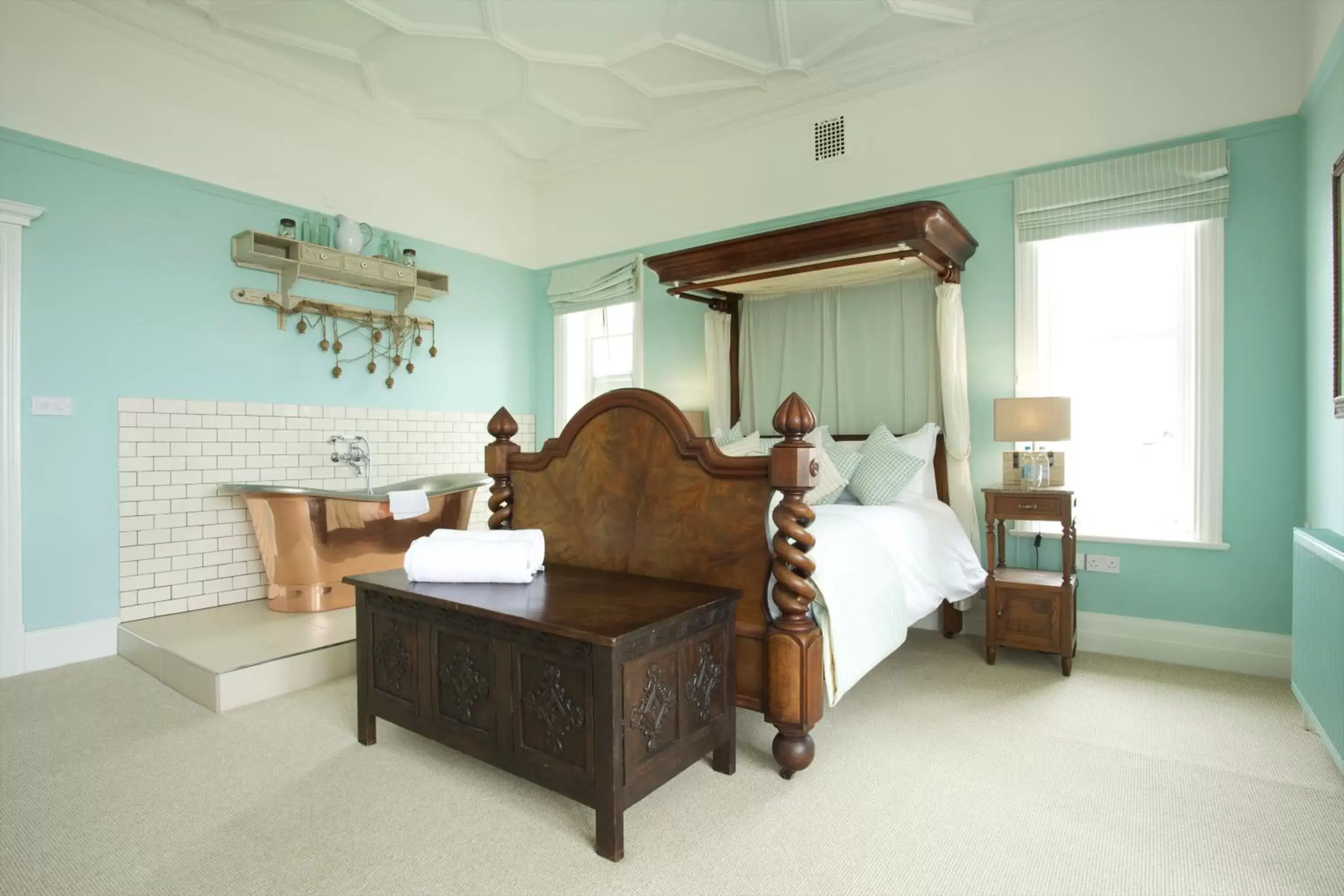 Bed, Seating Area in The Beach House