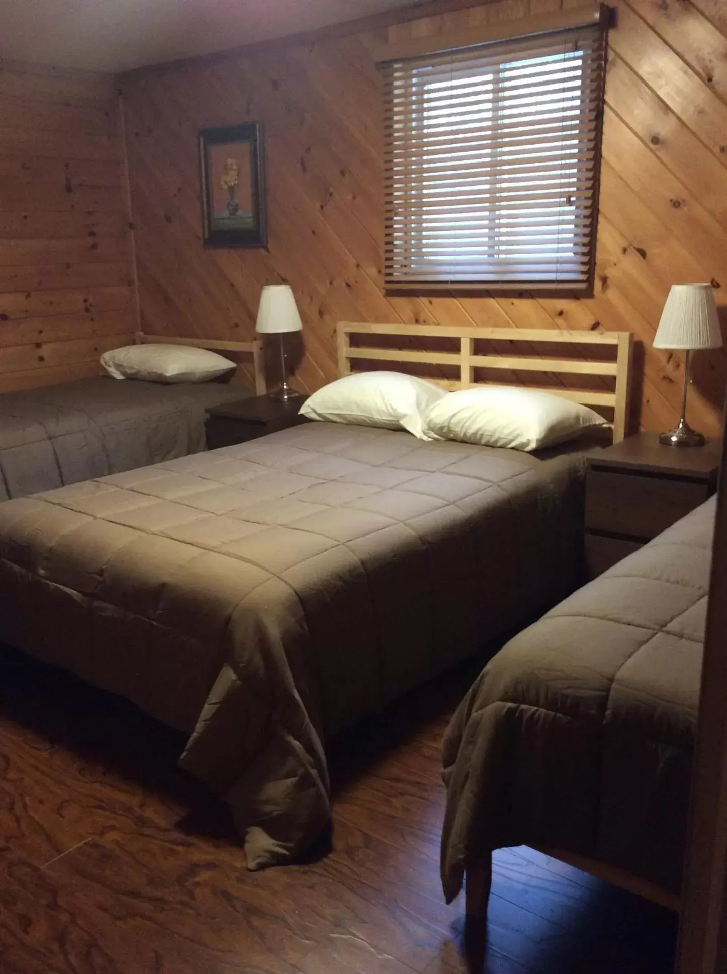 Bed in Madawaska Lodge