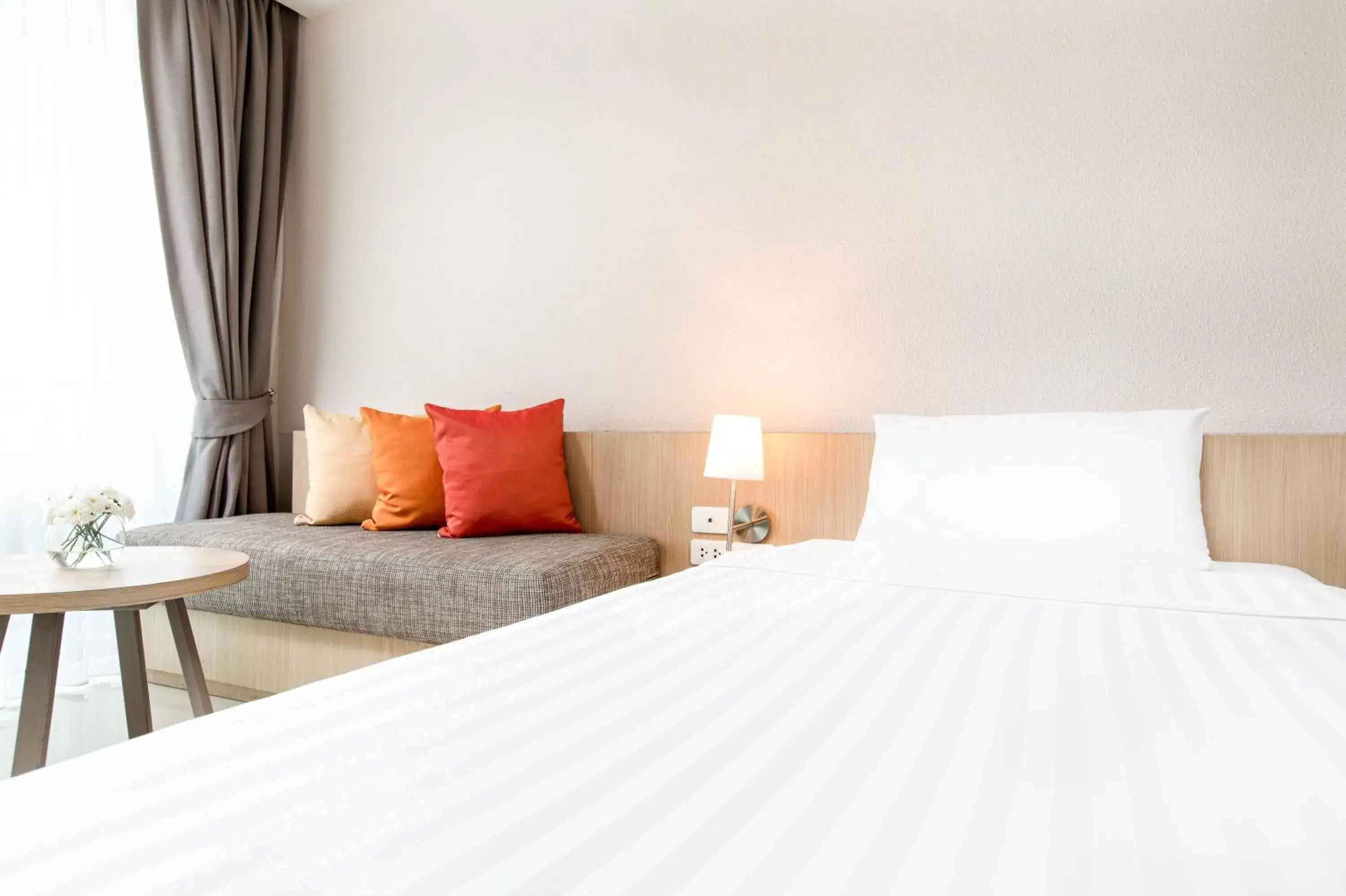 Bed in Prima Hotel Pattaya