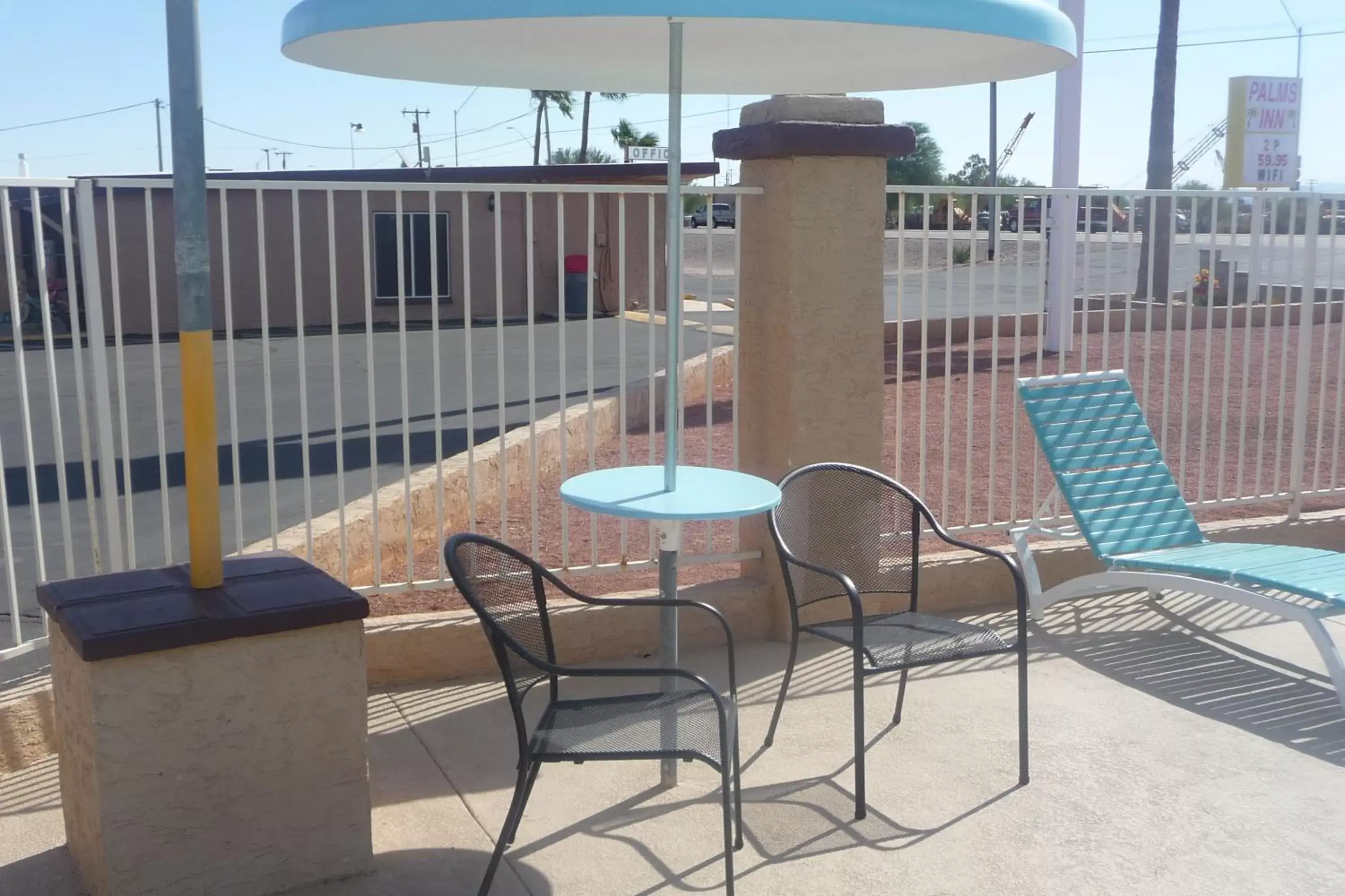 Pool view, Balcony/Terrace in Palms Inn