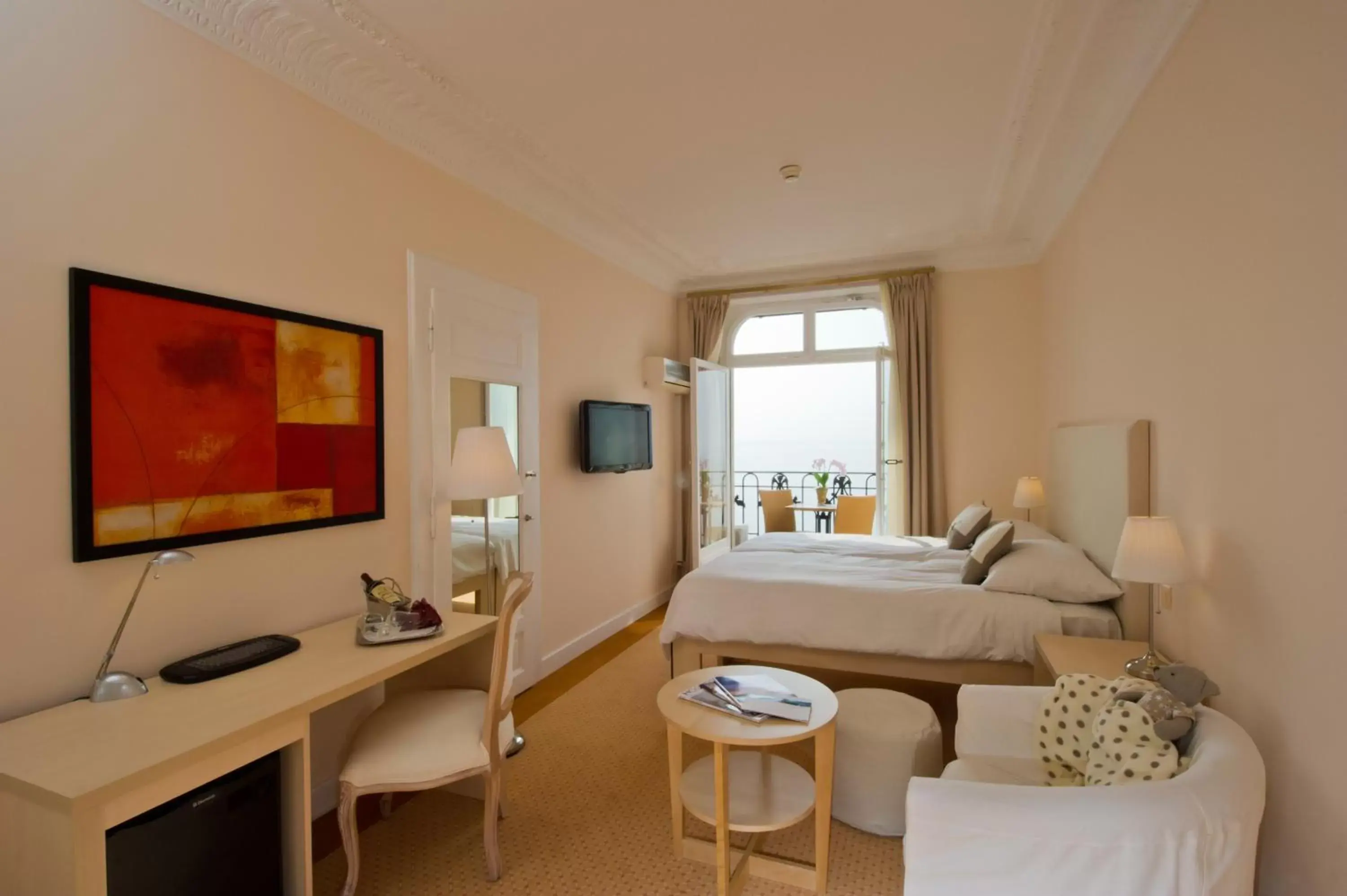 Deluxe Double Room with Balcony and Lake View in Hôtel du Grand Lac Excelsior Deluxe Double Room with Balcony and Lake View in Hôtel du Grand Lac Excelsior