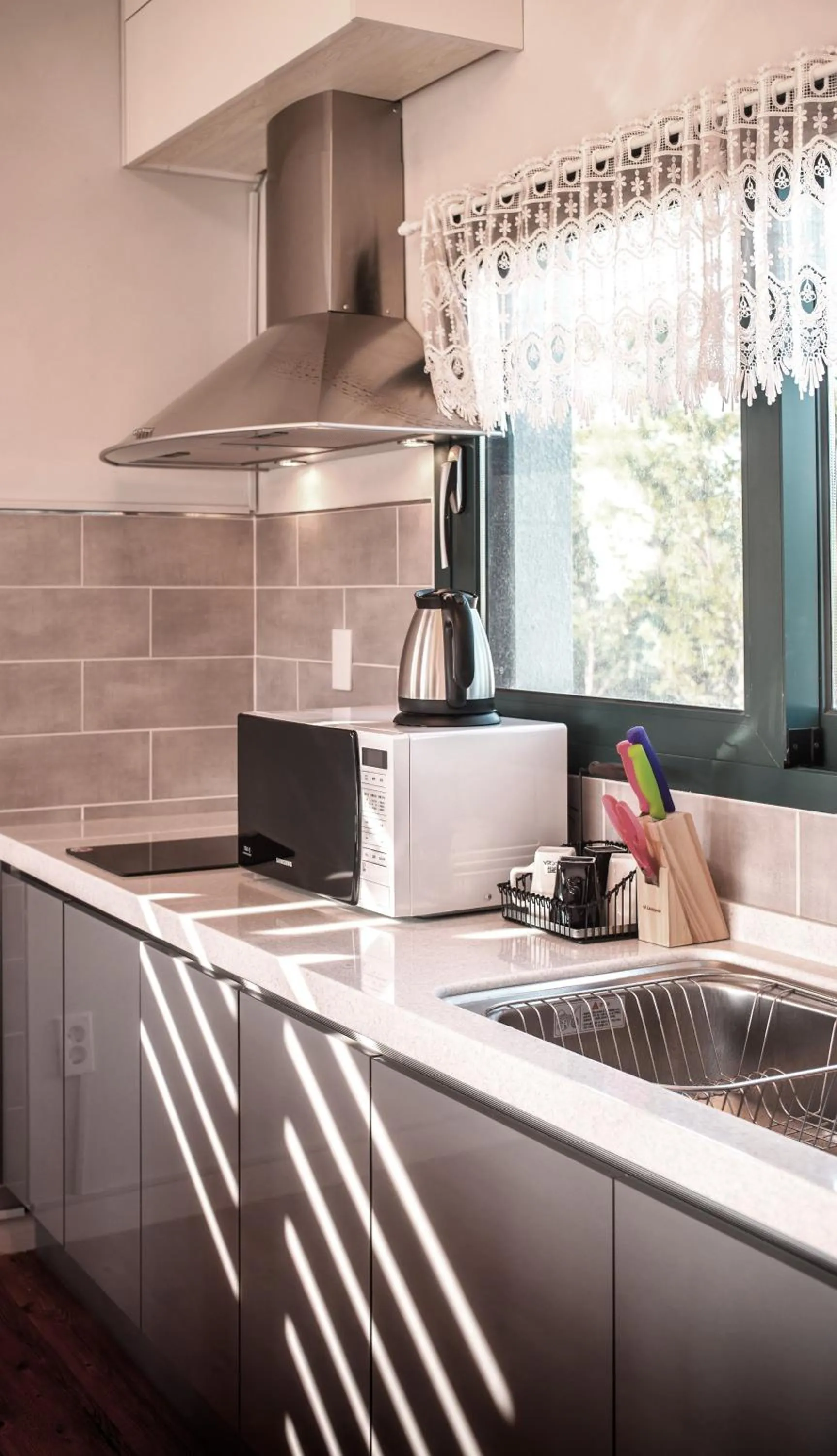 Kitchen or kitchenette in Poema Stay Pension