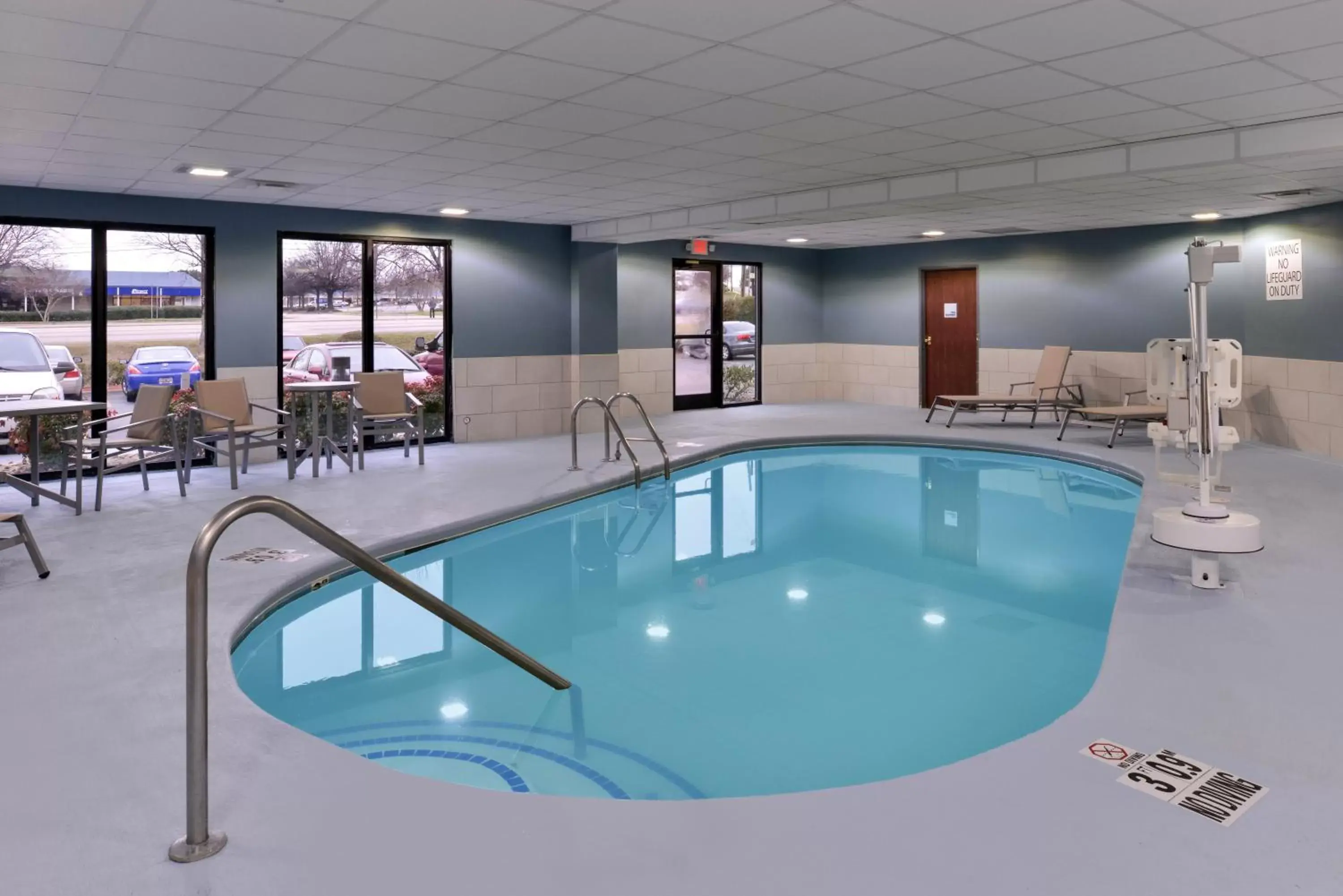 Swimming Pool in Holiday Inn Express & Suites Raleigh NE - Medical Ctr Area, an IHG Hotel