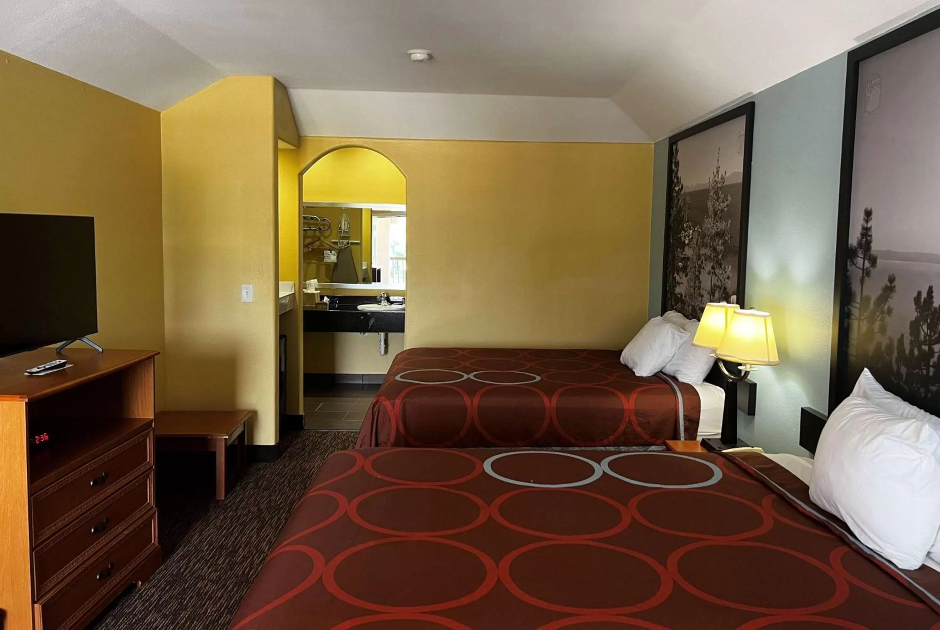 Photo of the whole room, Bed in Super 8 by Wyndham Montgomery/ Lake Conroe