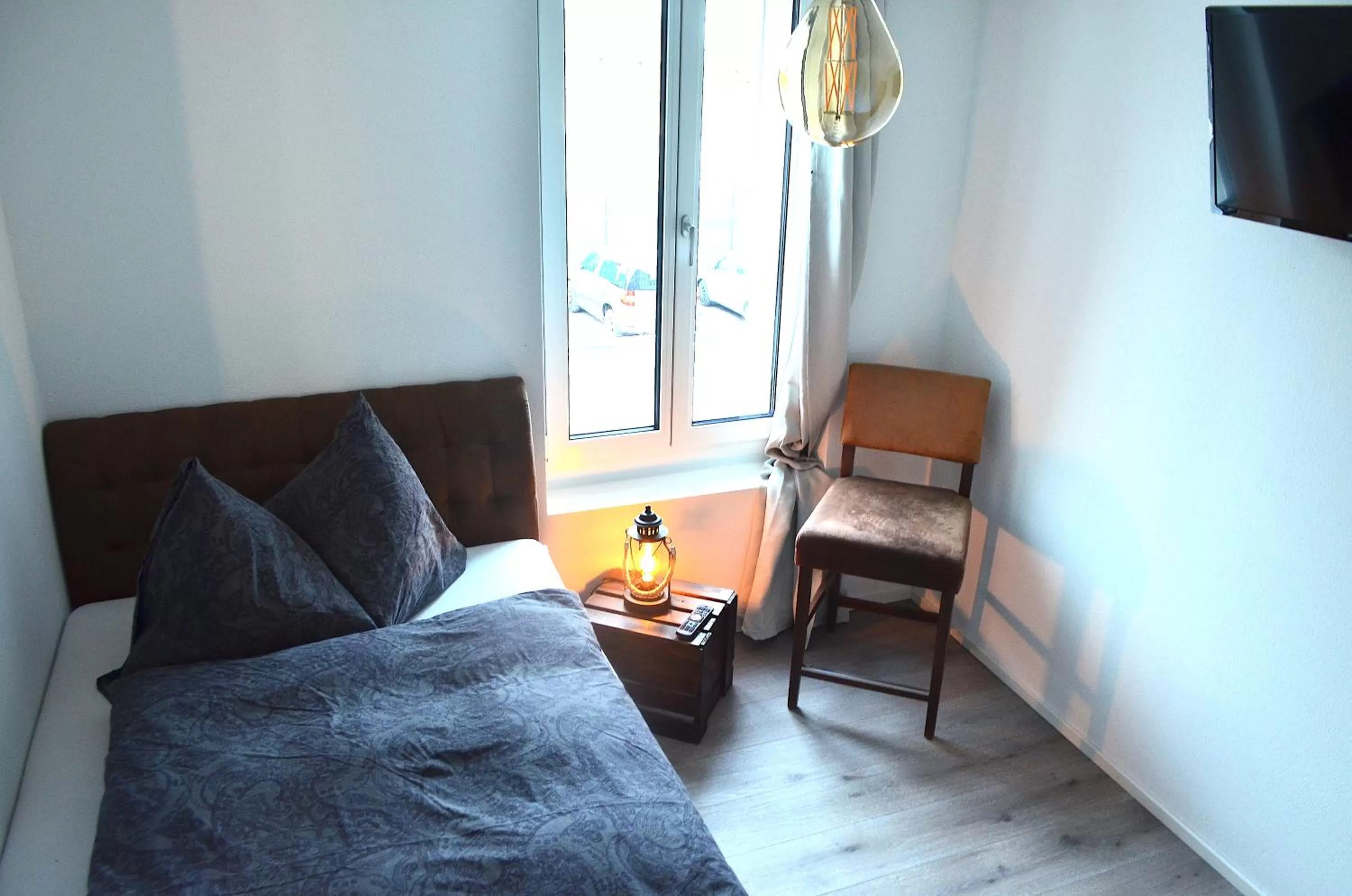 Bedroom, Bed in Guesthouse Meitschi Thun - contactless self check-in