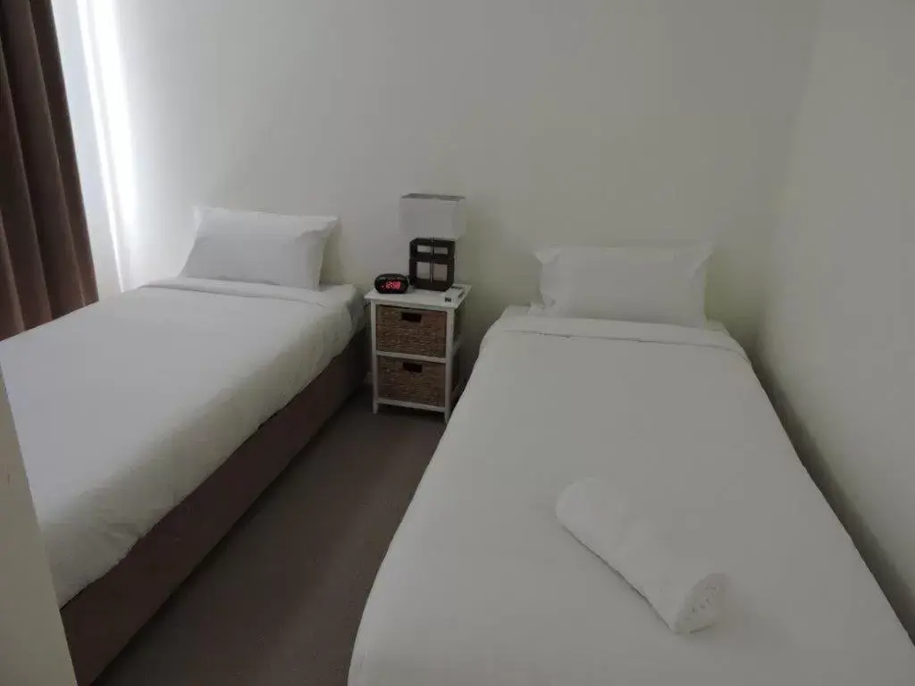 Bed in Koola Beach Apartments Bargara
