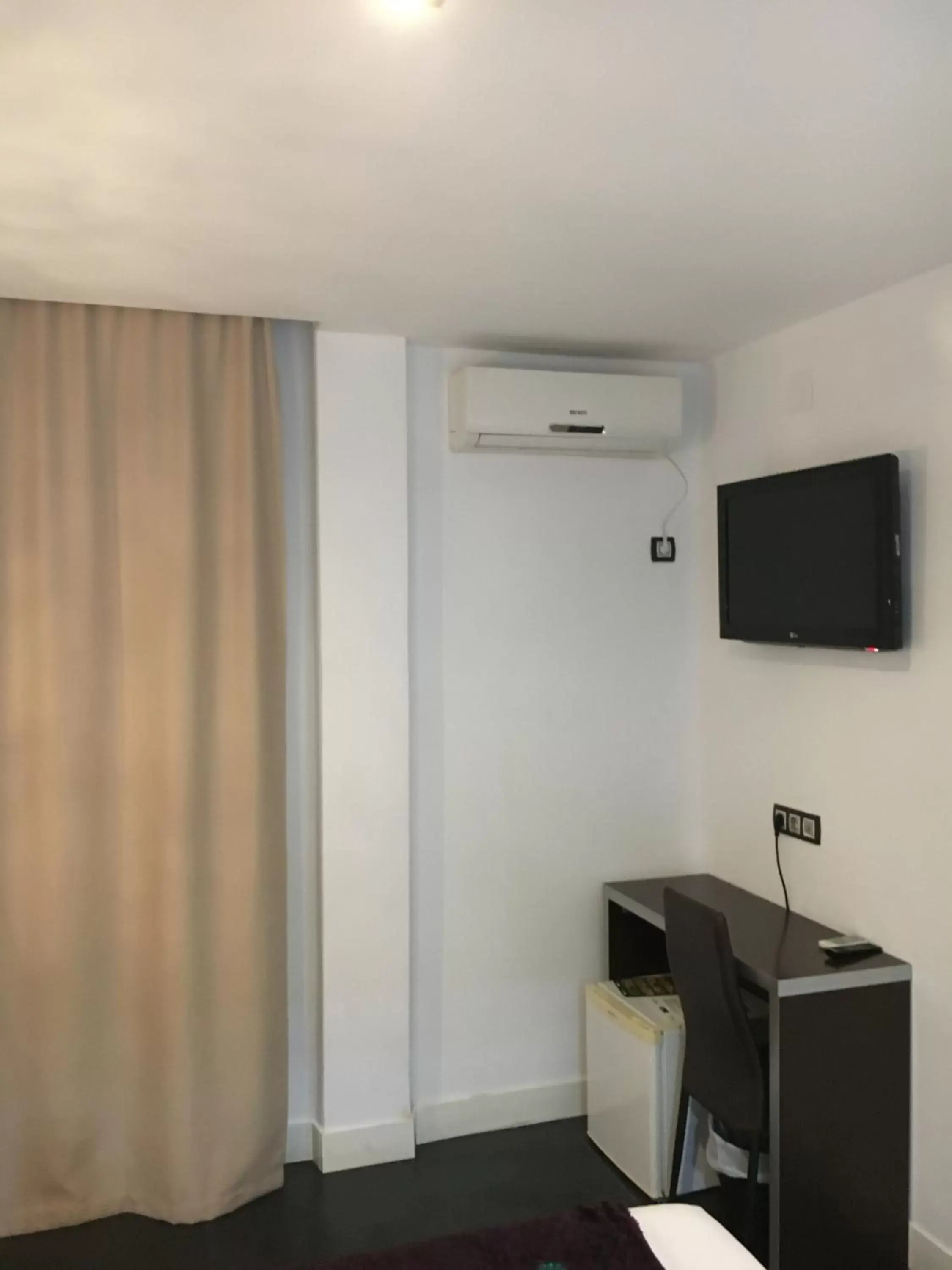 TV and multimedia, TV/Entertainment Center in Hotel Natursun