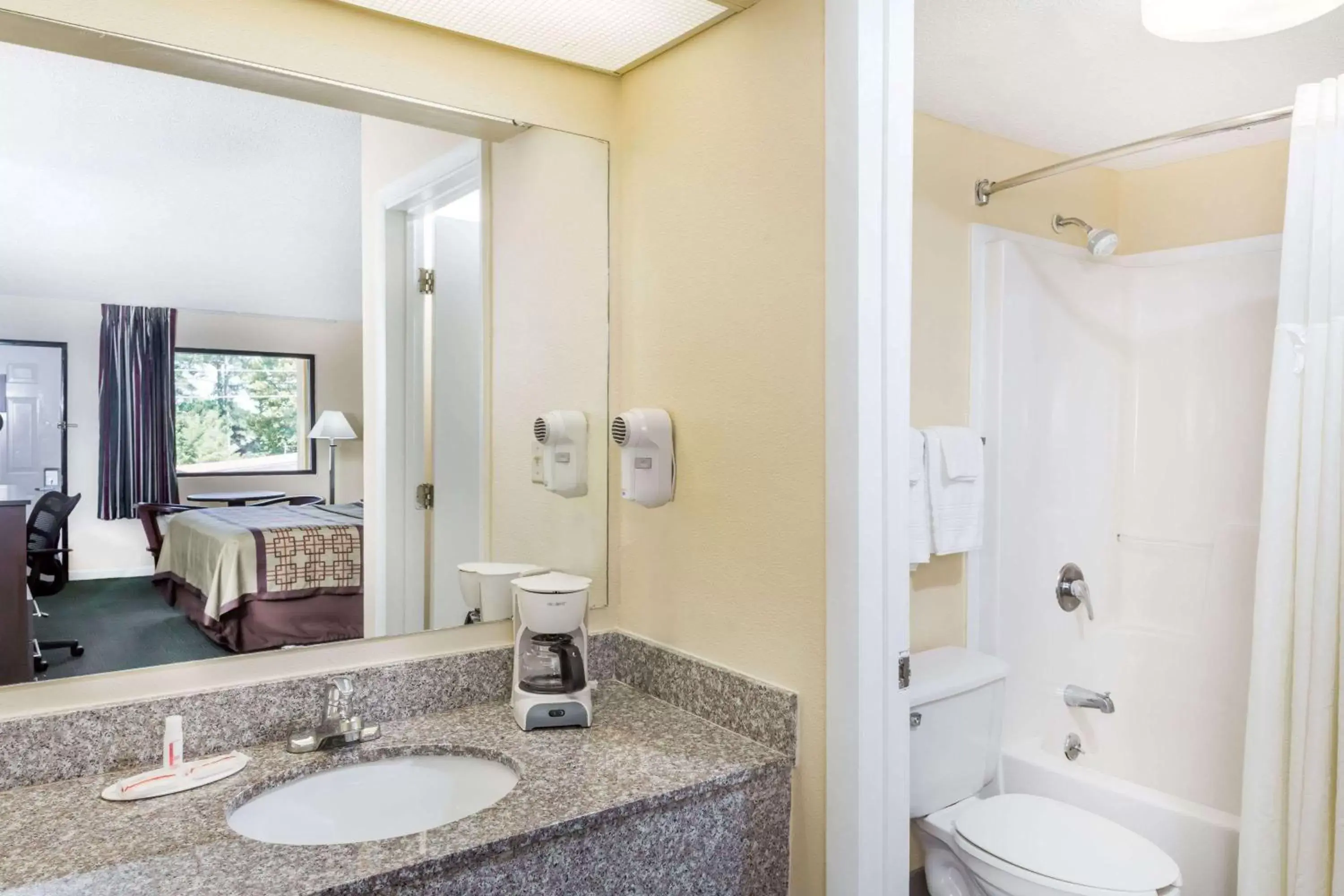 Bathroom in Days Inn by Wyndham Enterprise