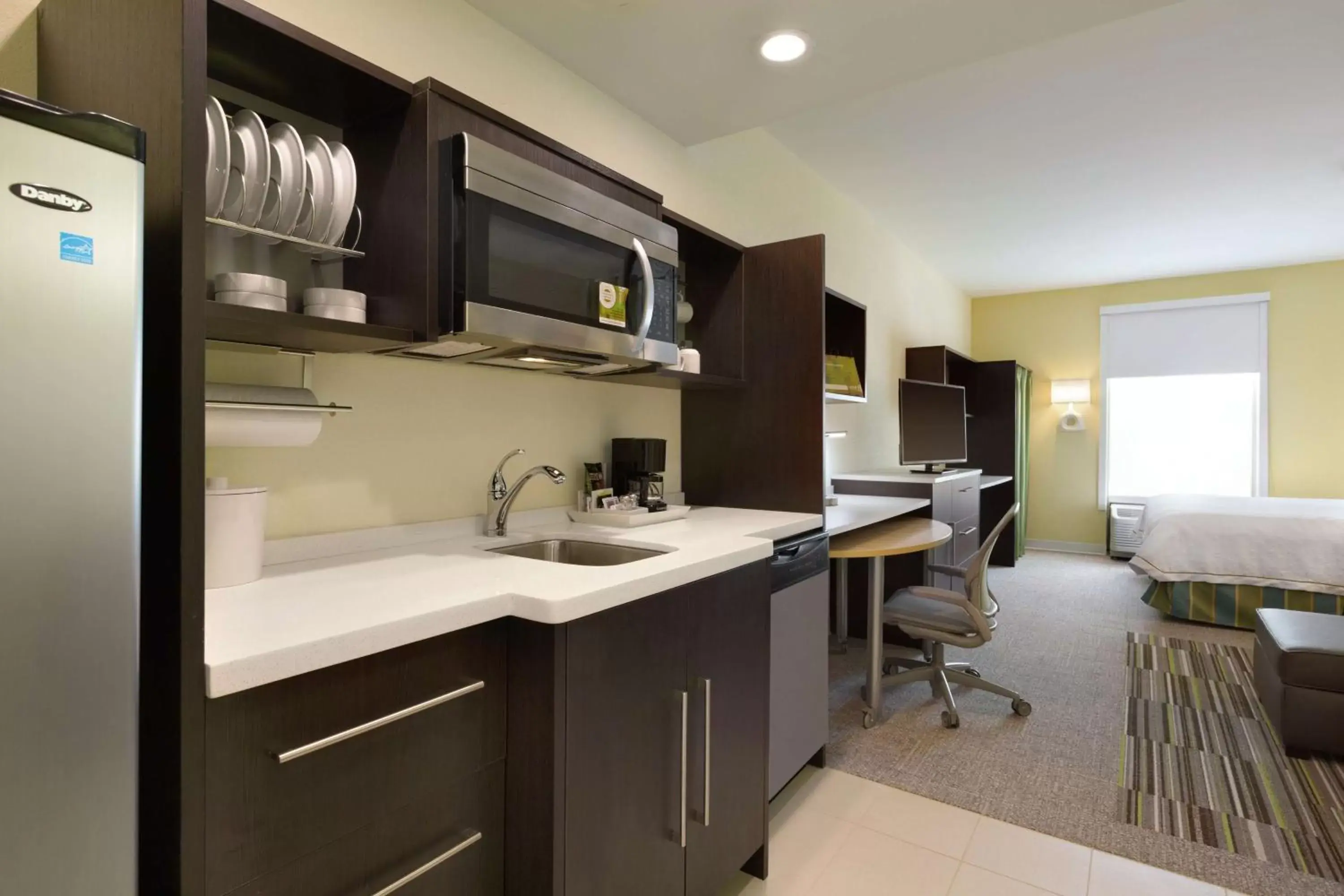 Bedroom, Kitchen/Kitchenette in Home2 Suites by Hilton Cincinnati Liberty Township