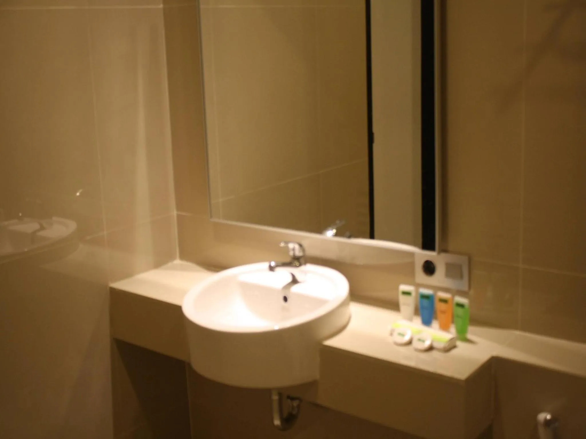 Bathroom in Sparks Odeon Sukabumi, ARTOTEL Curated